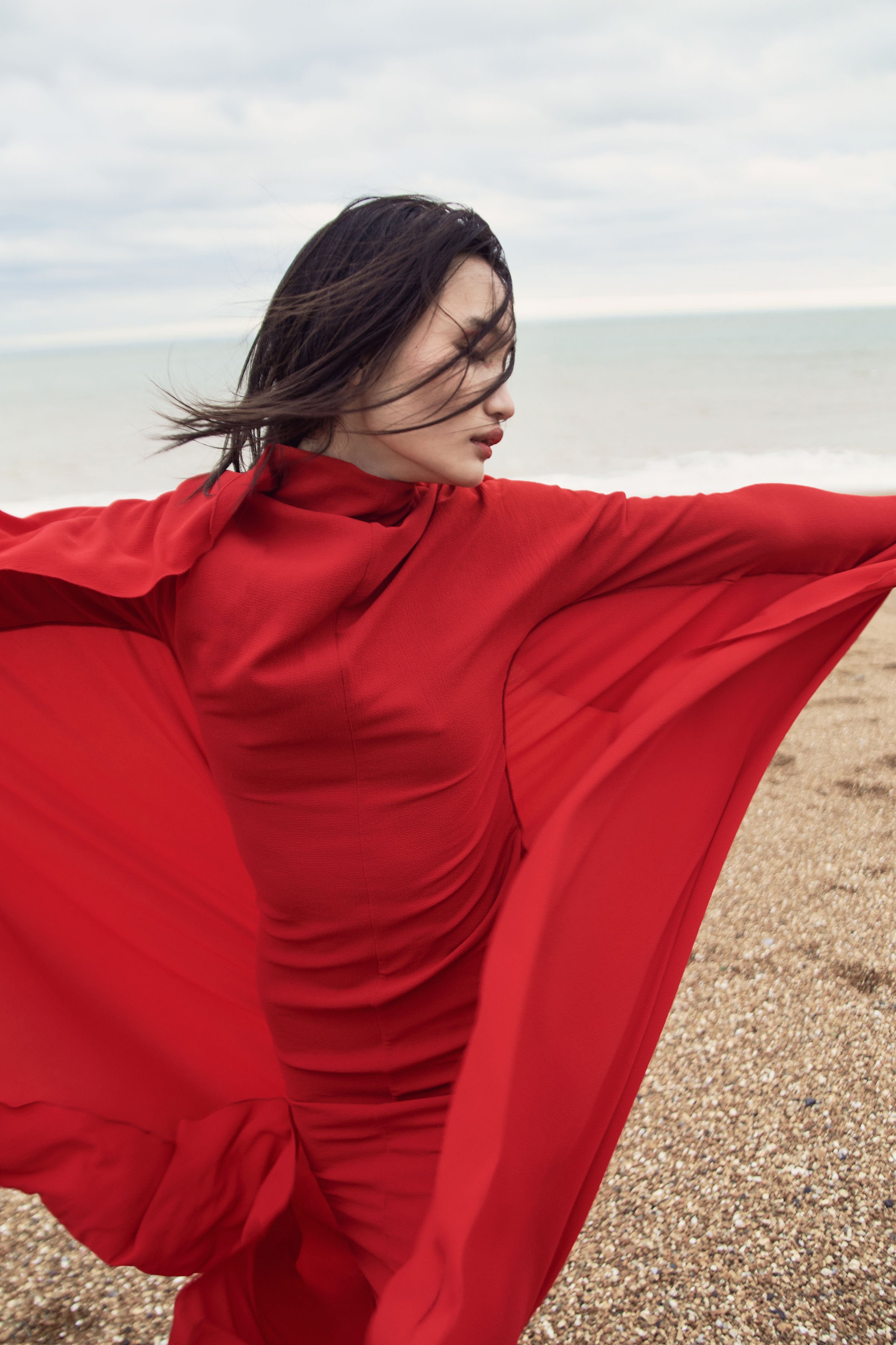 River Nile for Overdue Magazine — Red silk caught full width against the sea