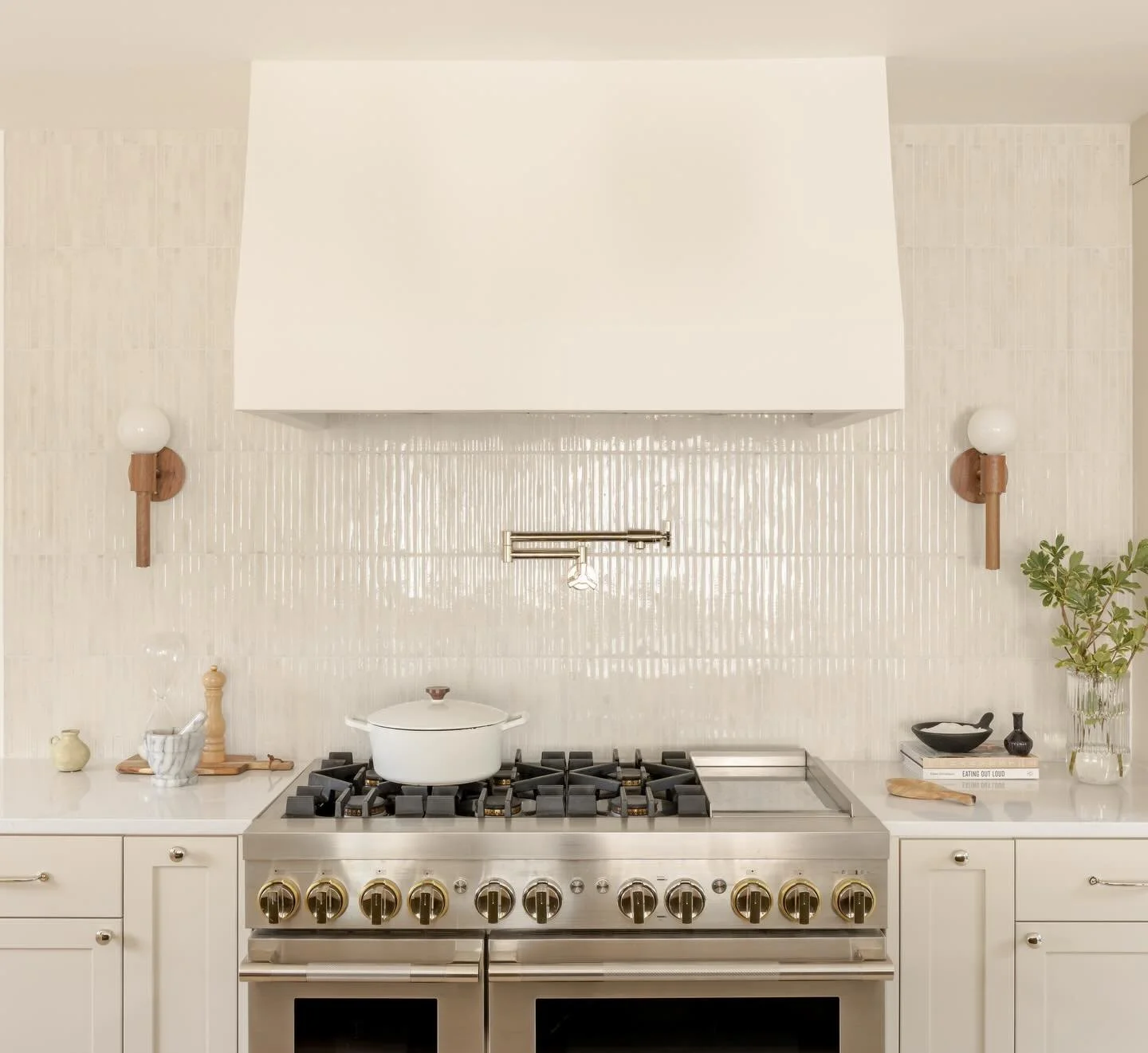 A beautiful, bright yet quiet moment. Soft details, warm creamy tones and little details can make even a very busy spot in the home feel calm &amp; collected.