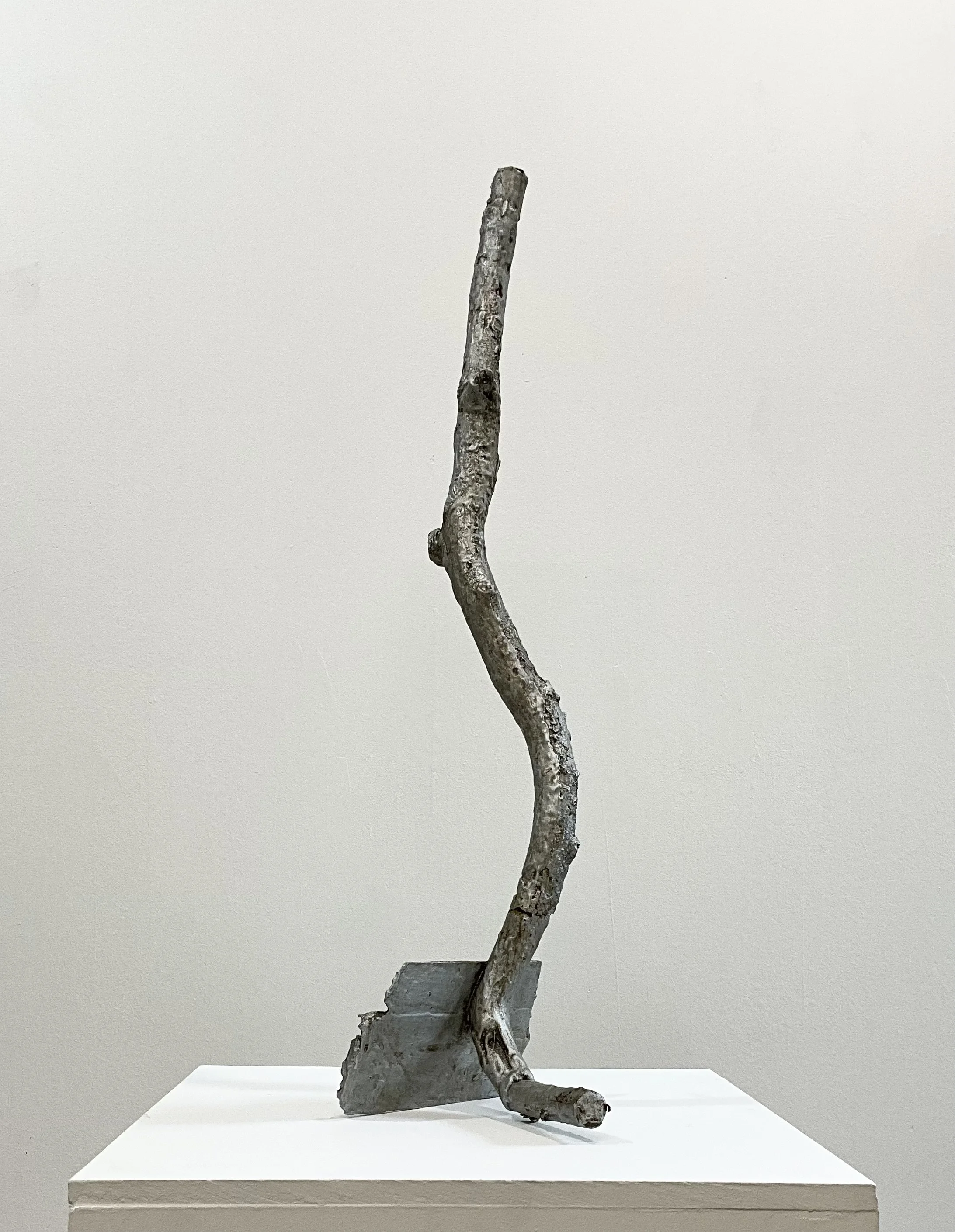 Untitled, 2024-25, wood, glue, cardboard, enamel, Aqua Resin, wax, 27” x 6 1/2” x 7”