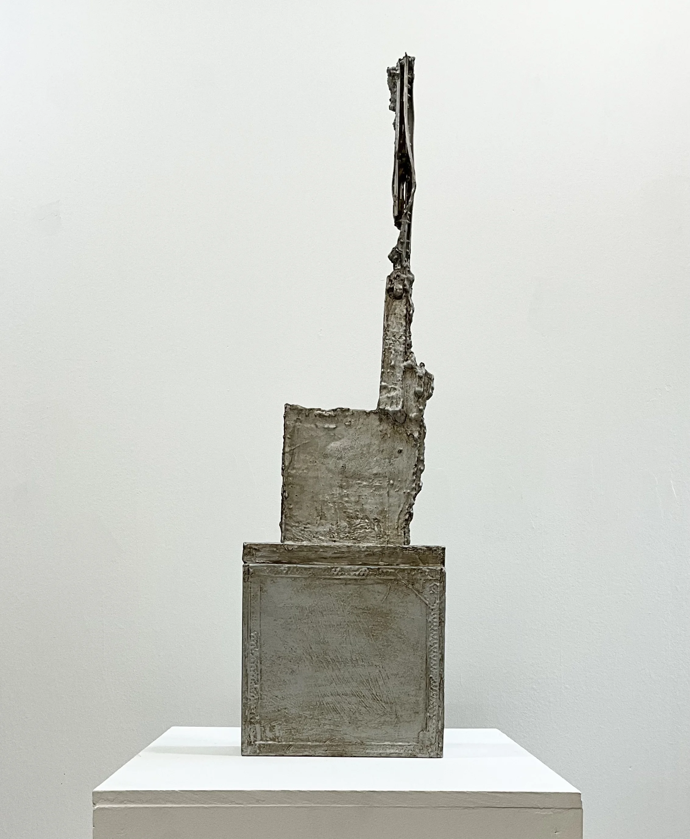 Counter Form, 2024-25, cardboard, aluminum, wood, glue screws, enamel, wax, 28” x 8” x 2 1/2”