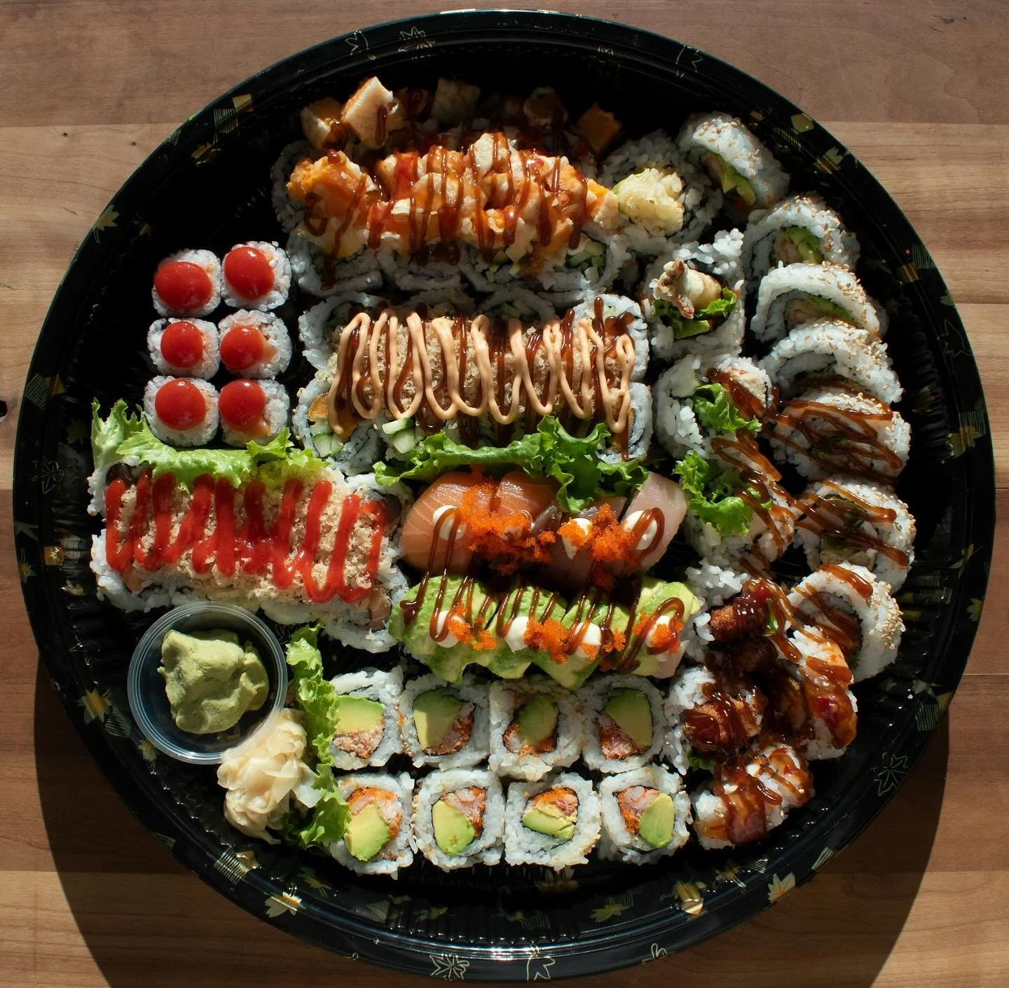 Our November Platter is here! This month our platter includes a Spicy Crab Caterpillar. Our classic Spicy Crab,  rolled caterpillar style with salmon tuna and avocado. Paired with a Tempura Yam Cucumber &amp; Cheese Roll and a selection of Daruma fav