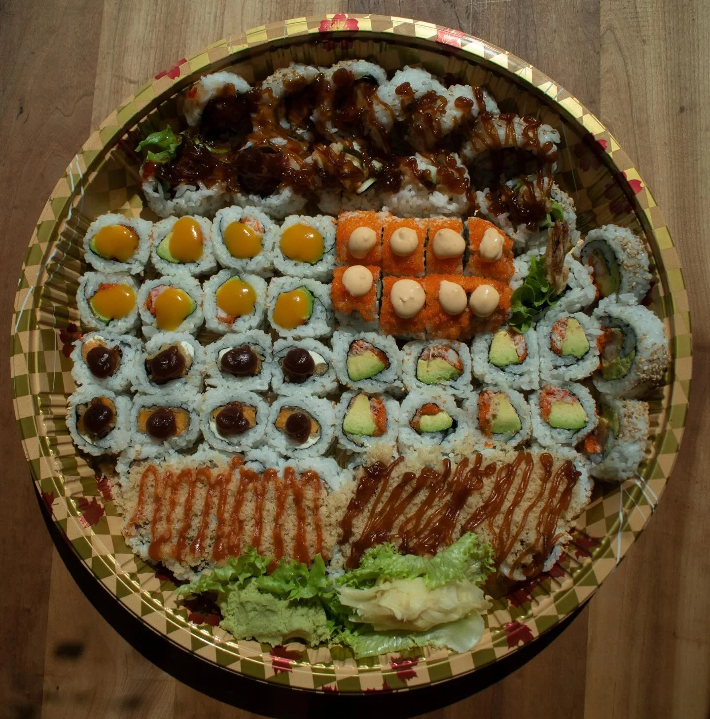 Summer is here and with it comes our June Platter! This month we doubled down on the classics! With two California Rolls alongside both Salmon and Tuna Bakudans, and the returning Avo Dynamite Roll. The June Platter includes the following 63 pieces:
