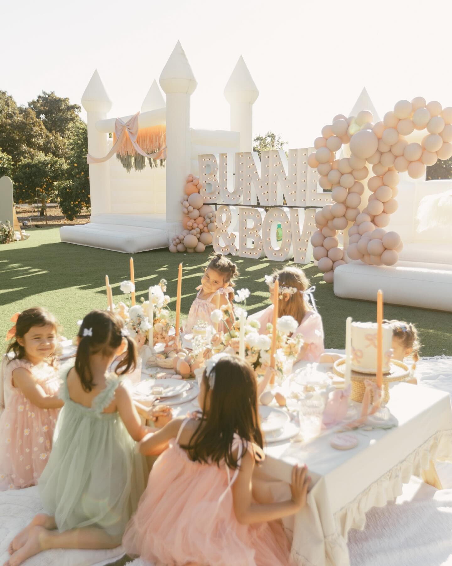 Happy, hoppy Easter from our Inflate Fam to yours 🤍🎀🐰

Photographer: @salome_palomino
Planning, design, backdrops, balloons + picnic set up:
@rentbohobabes
Planning and bounce house: @inflatesandiego
Venue: @ranchoguejitoweddings
Acrylic Signage +