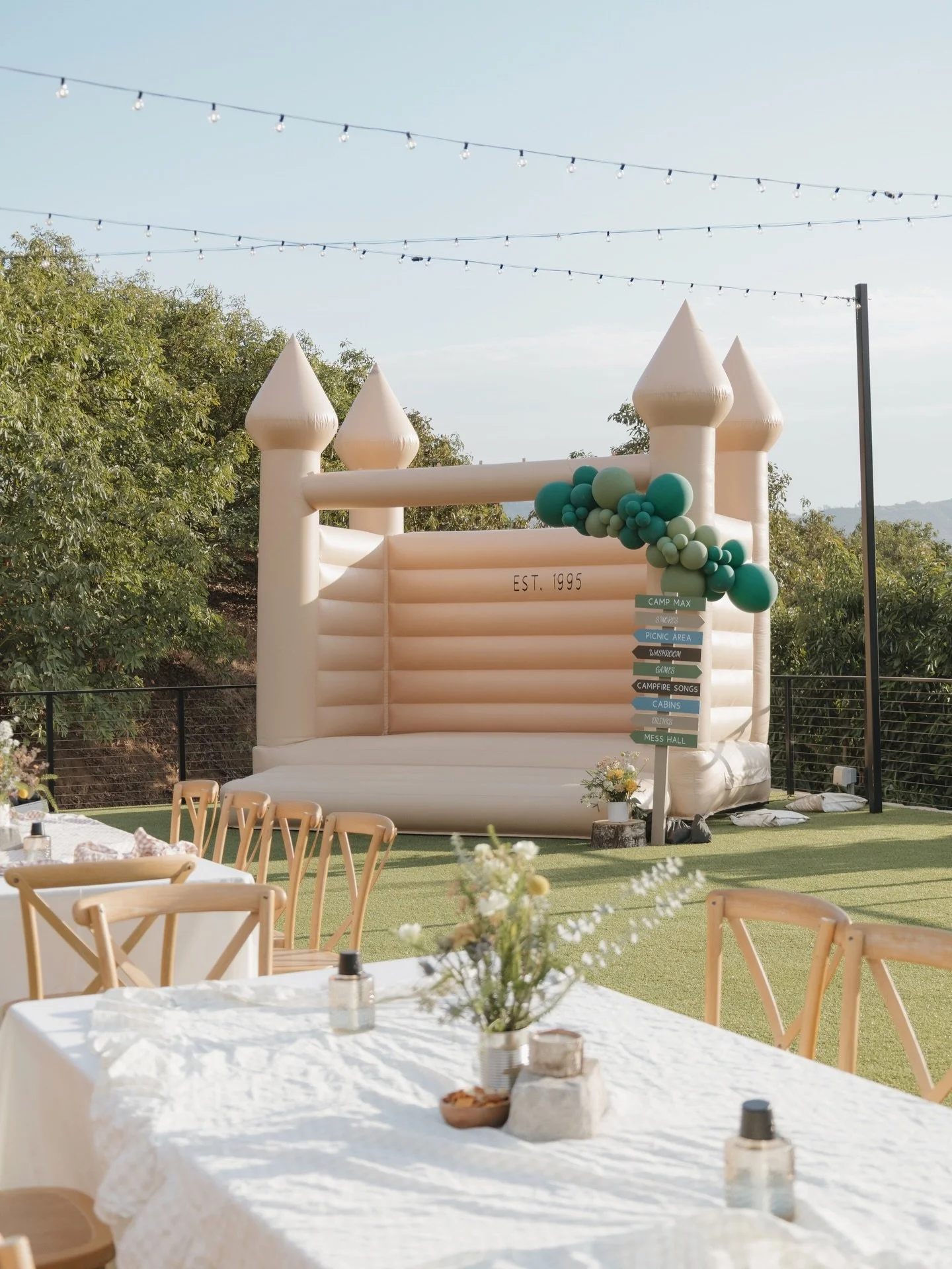 Who says you can&rsquo;t have a bounce house at your 30th birthday?! Enter.. CAMP MAX 🌲✨
bounce house, camp signs, cozy tablescapes, s&rsquo;mores, and a full-on &ldquo;mess hall&rdquo; moment 🏕️🍔 what more could you want?!

Planning:&nbsp;@inflat
