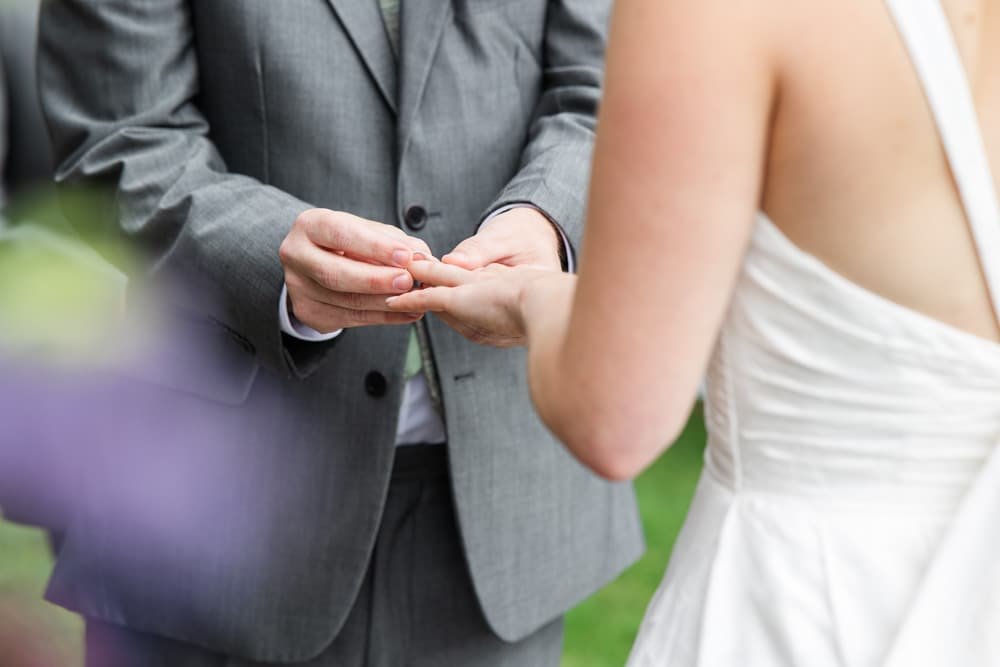 ring exchange at manor house wedding ceremony