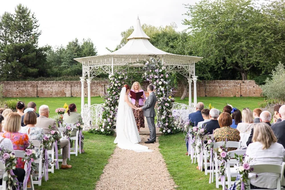 outdoor wedding ceremony at manor house