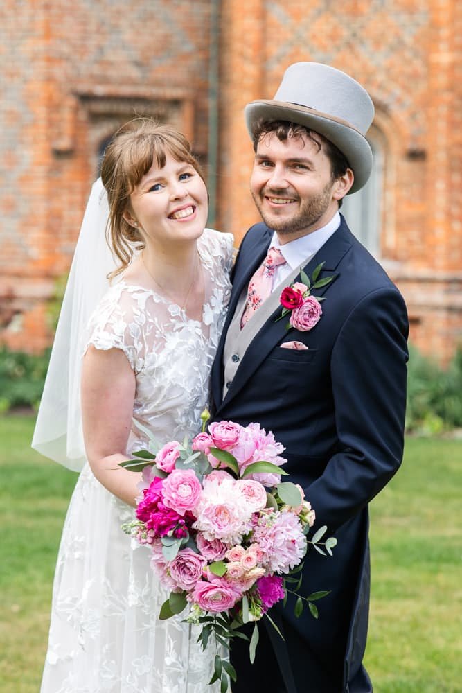 wedding portrait of bride and groom at Layer Marney Tower