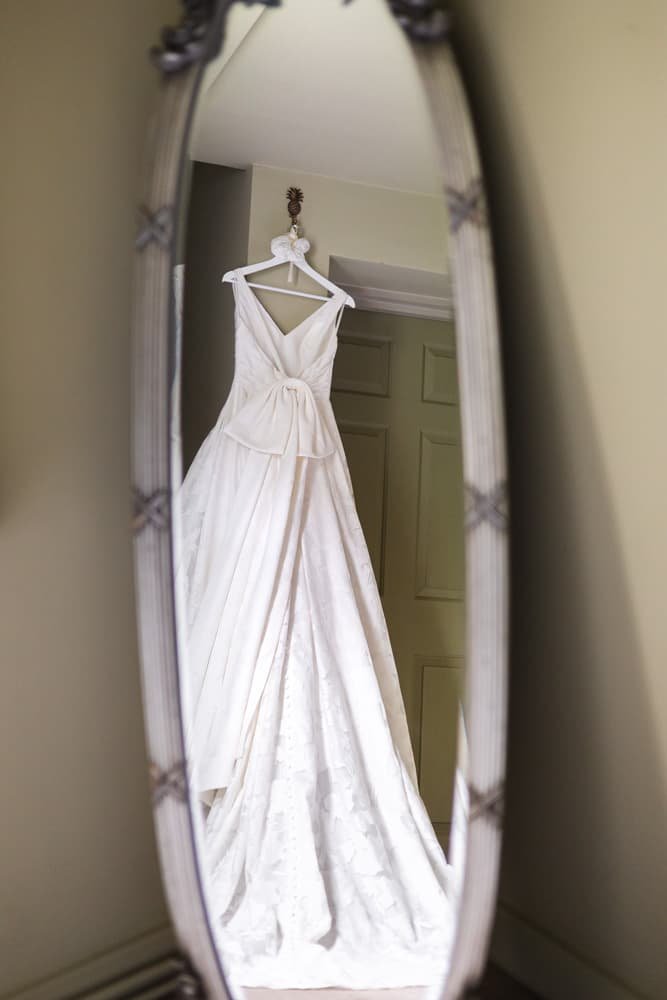 wedding dress hanging up