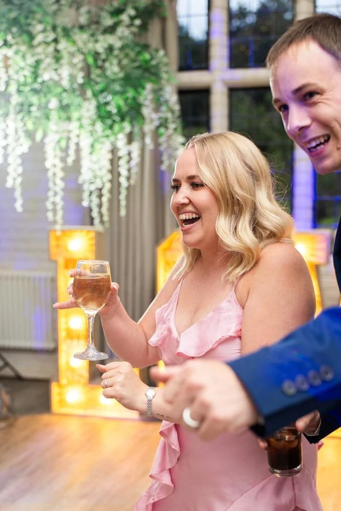 guests dancing at manor house wedding