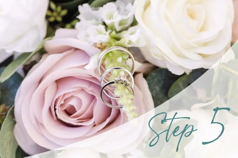 colchester wedding photo of wedding rings and flowers