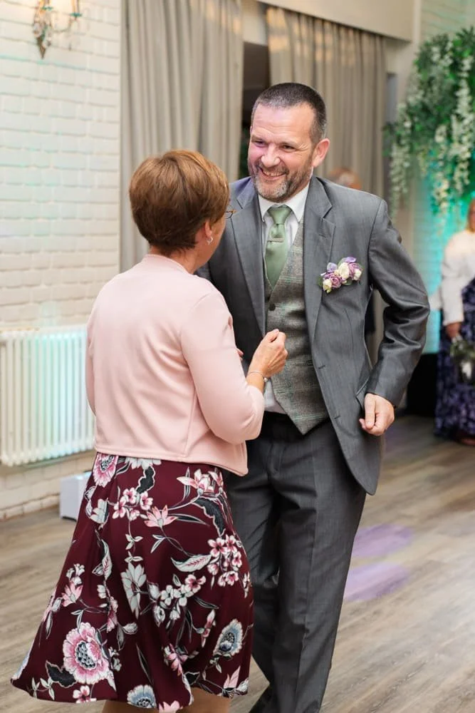 groom dancing  at wedding