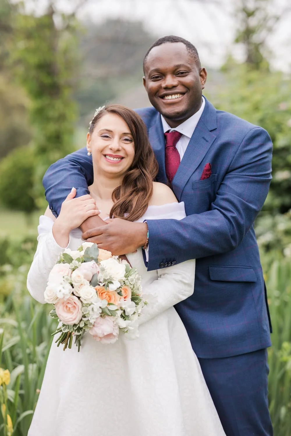 natural wedding portrait of bride and groom at Wivenhoe house