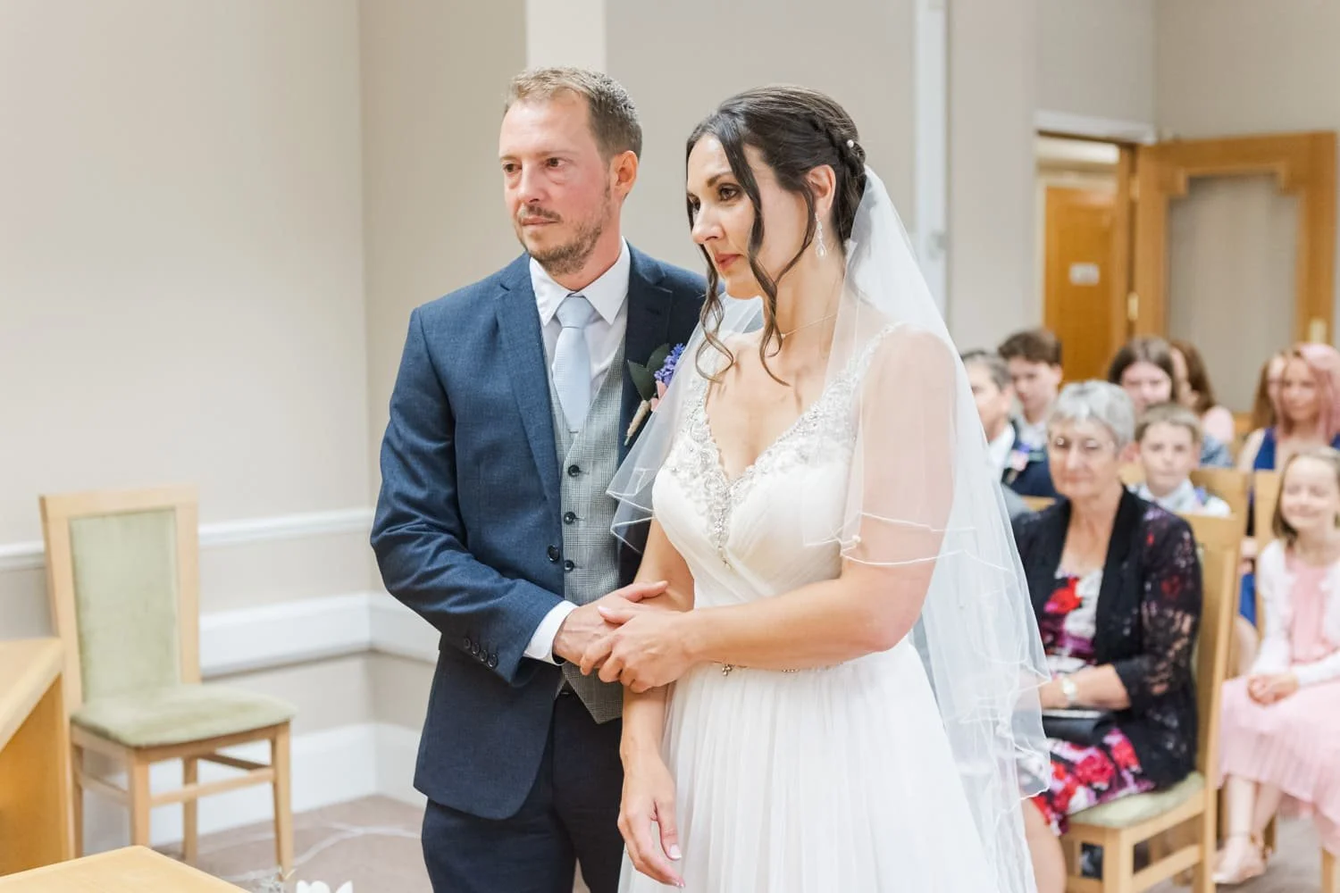 emotional couple during ceremony in Community Room at Colchester Town Hall