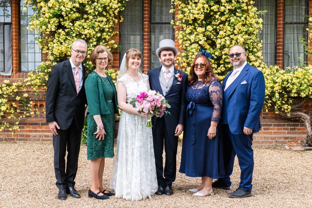 formal group photo with couples parents