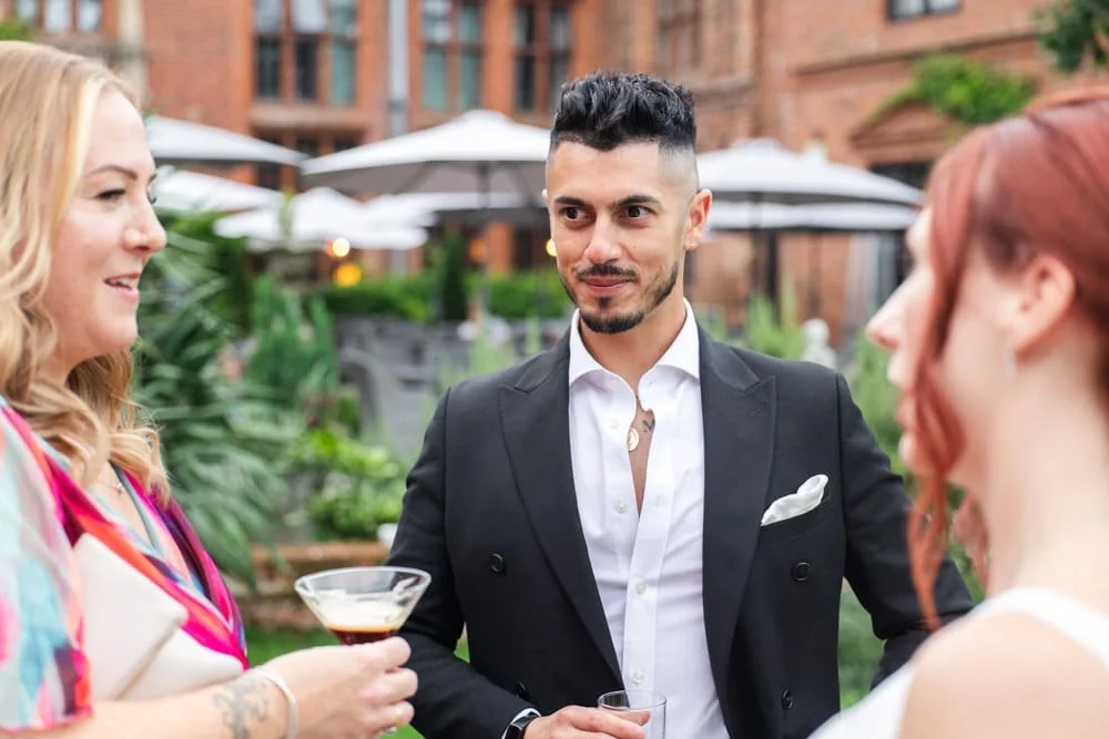 wedding guests talking