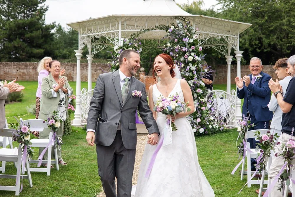 outdoor wedding ceremony at manor house