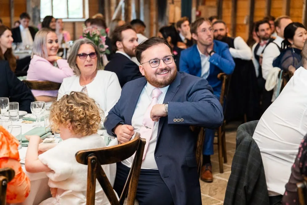 wedding guests enjoying speeches at layer marney