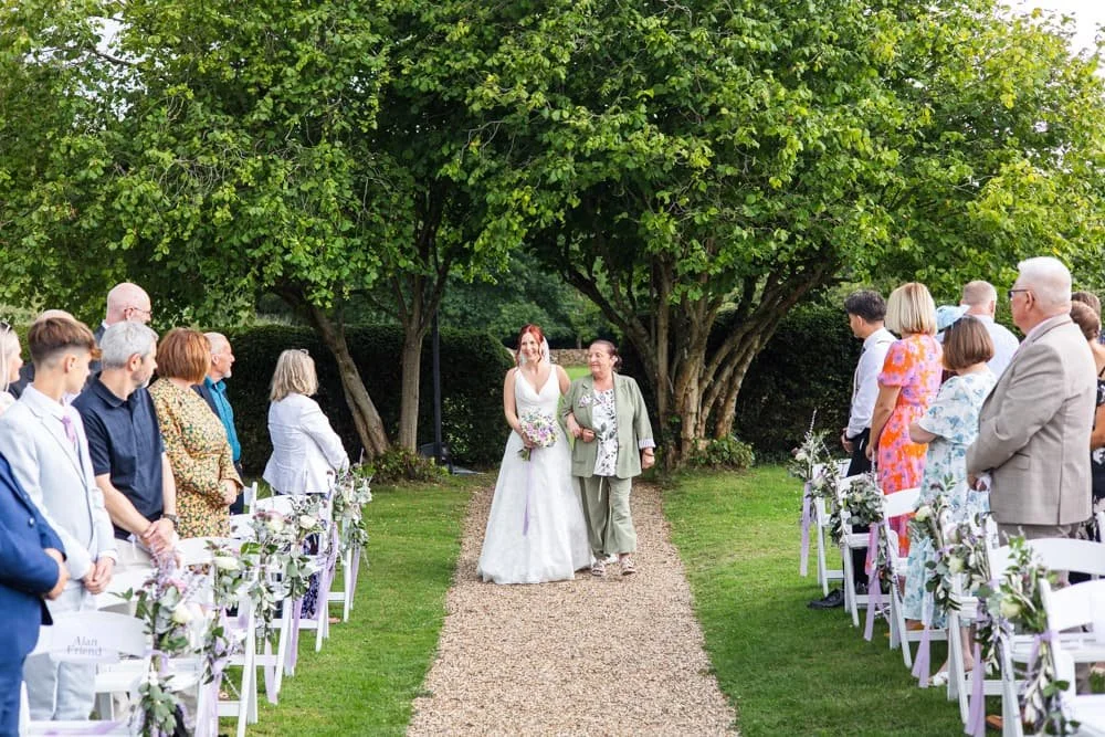 bride entrance to ceremony with her mum