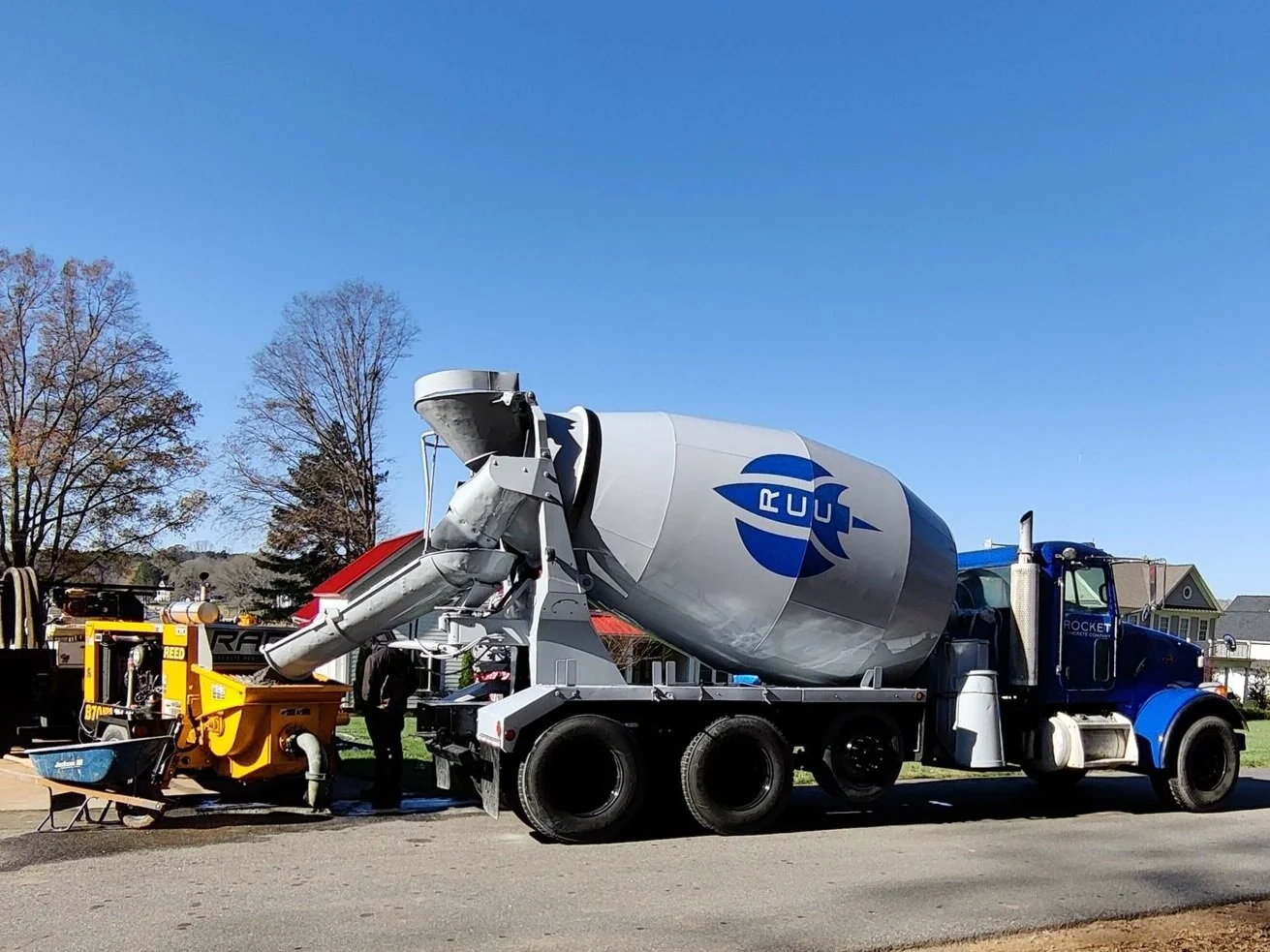Rocket Concrete mixer truck delivering ready-mix concrete at a job site in Cornelius, NC