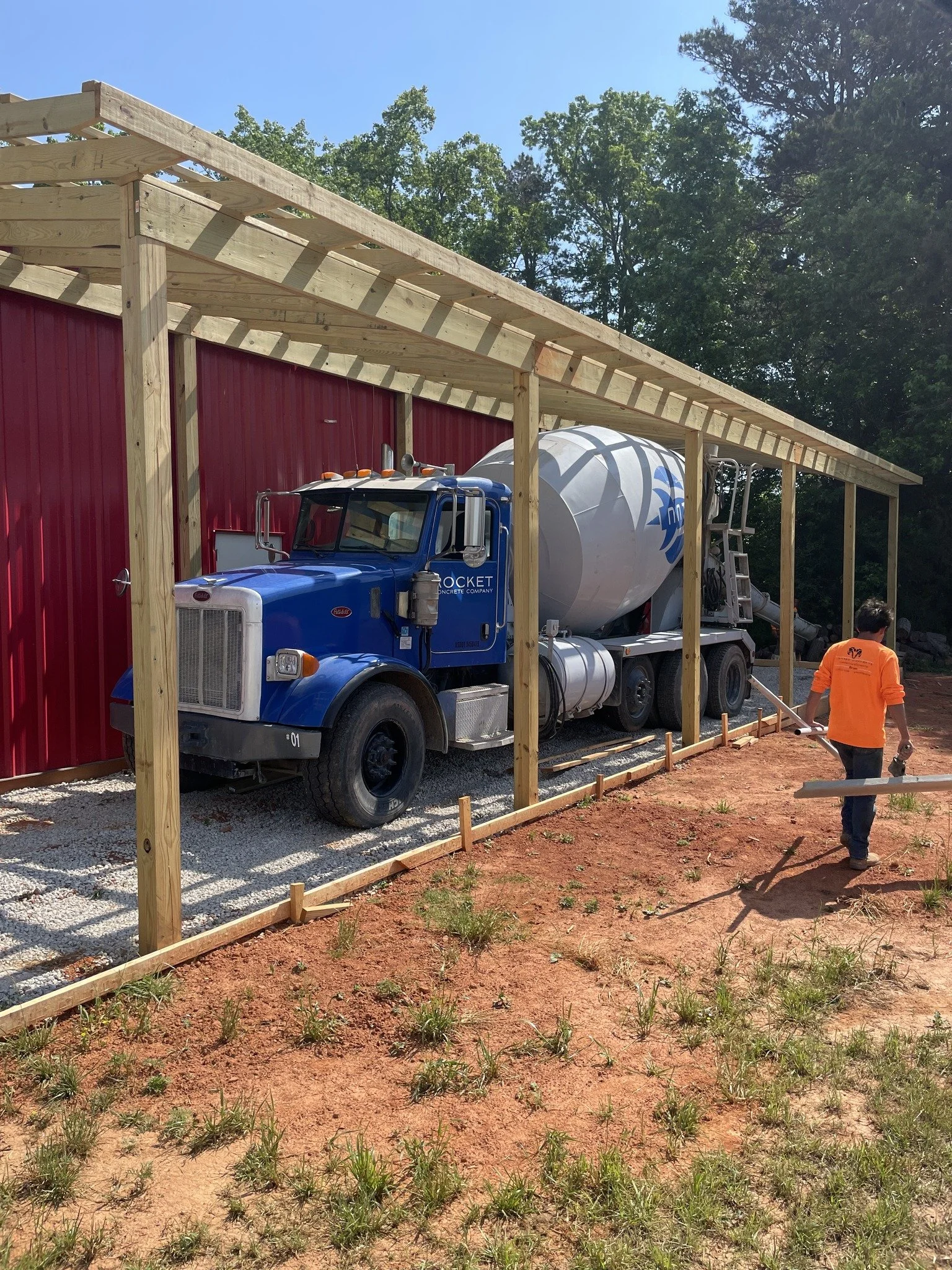 Concrete mixer truck pouring concrete in Davidson, NC