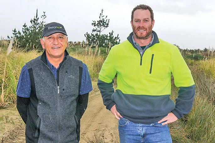 Tapora Landcare Group chairman Earle Wright, left, and committee member Nick Common. Just this month, Nick got his tractor stuck trying to help an off-road driver out of the sand and had to bring in a digger.