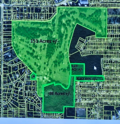 Map showing three sections of land with different sizes: 151 acres, 28 acres, and 5.02 acres, surrounded by residential areas.