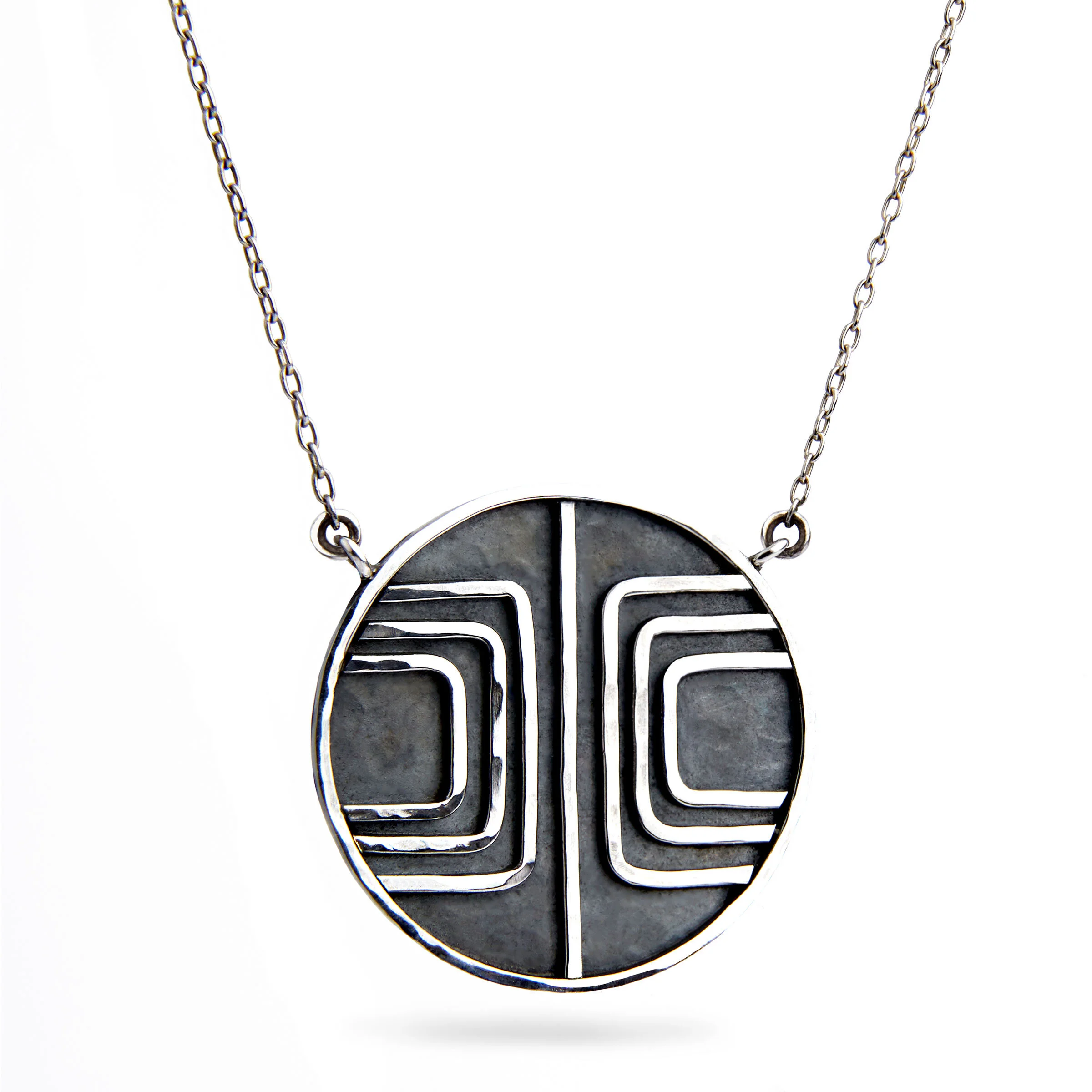 Hand fabricated silver necklace made in San Francisco by Denise Heffernan