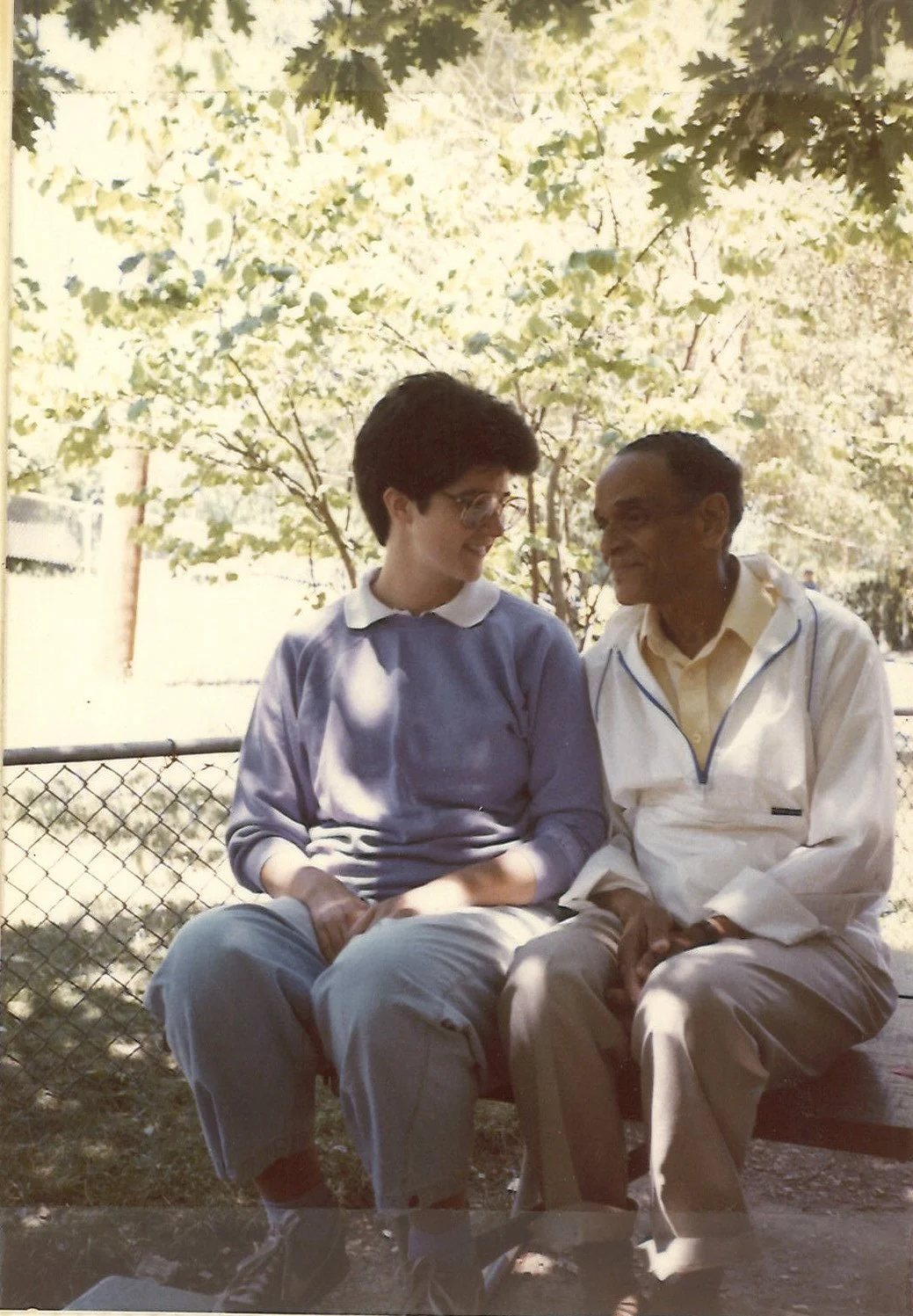 Current Family Services Director, Beth Baker, shares a moment with "Grandpa Jimmy", who worked as a foster grandparent through the City of Philadelphia.