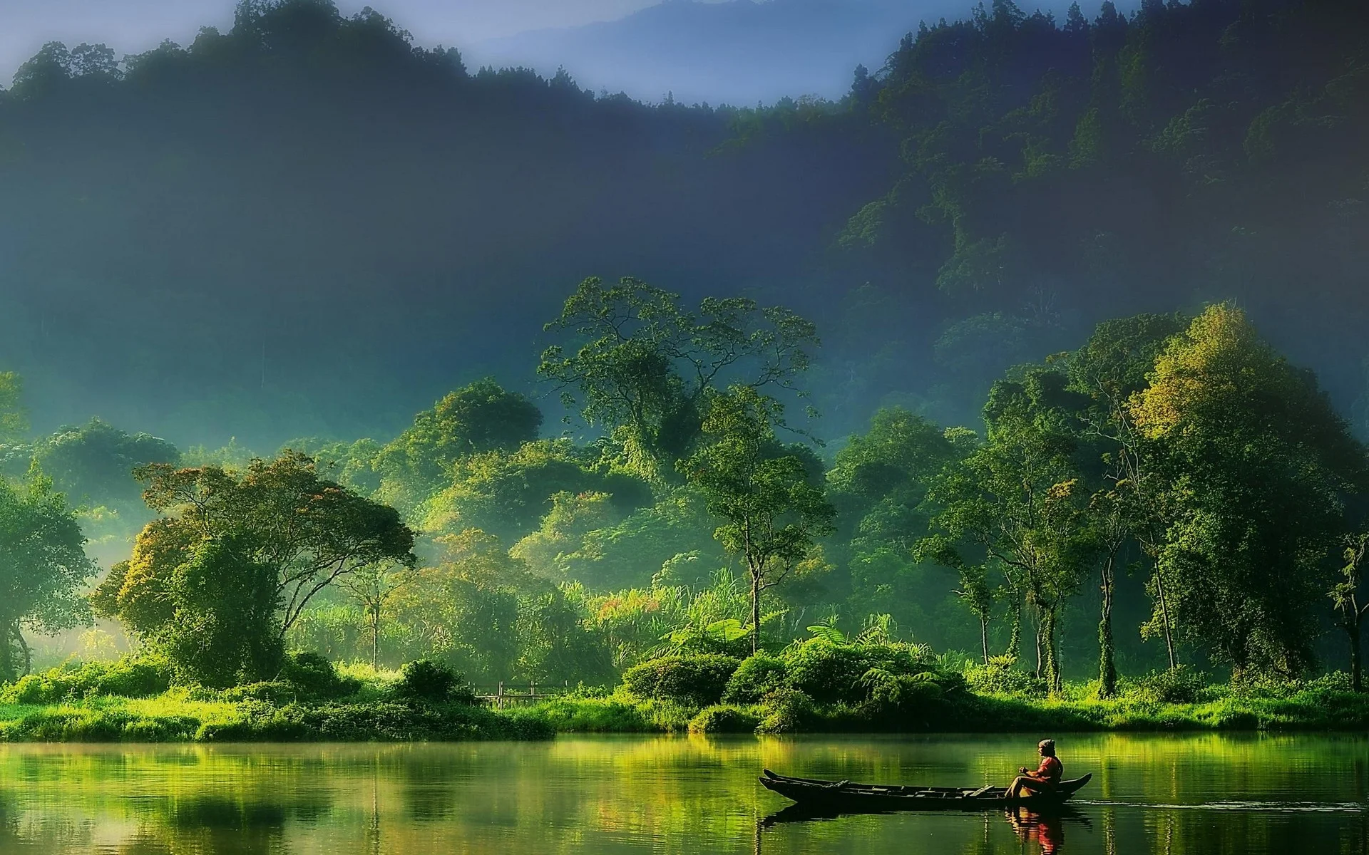 216226-nature-landscape-mist-sunrise-forest-river-mountain-Indonesia-green-boat-fisherman.jpg