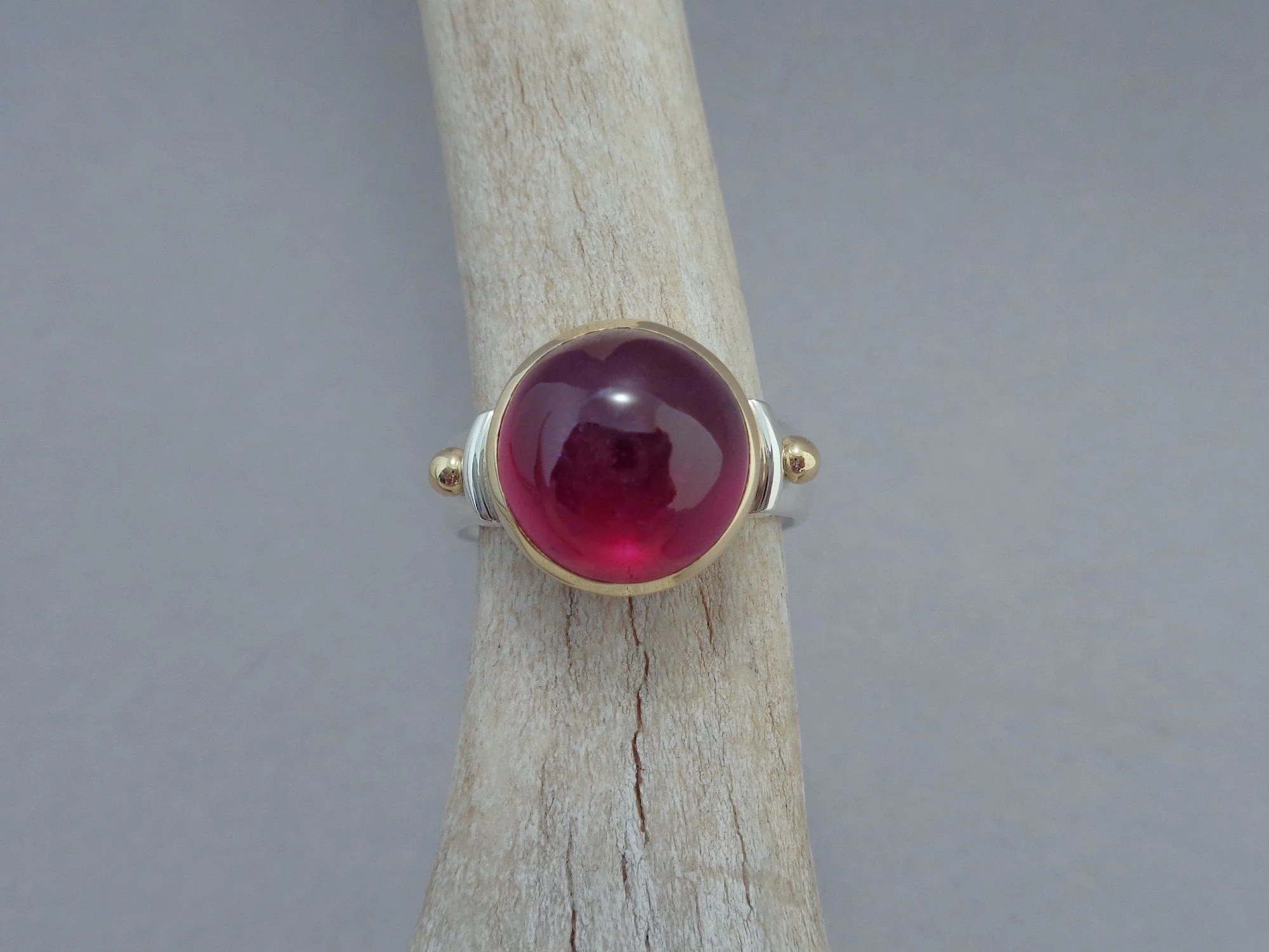 red ruby in gold and silver ring x.jpg