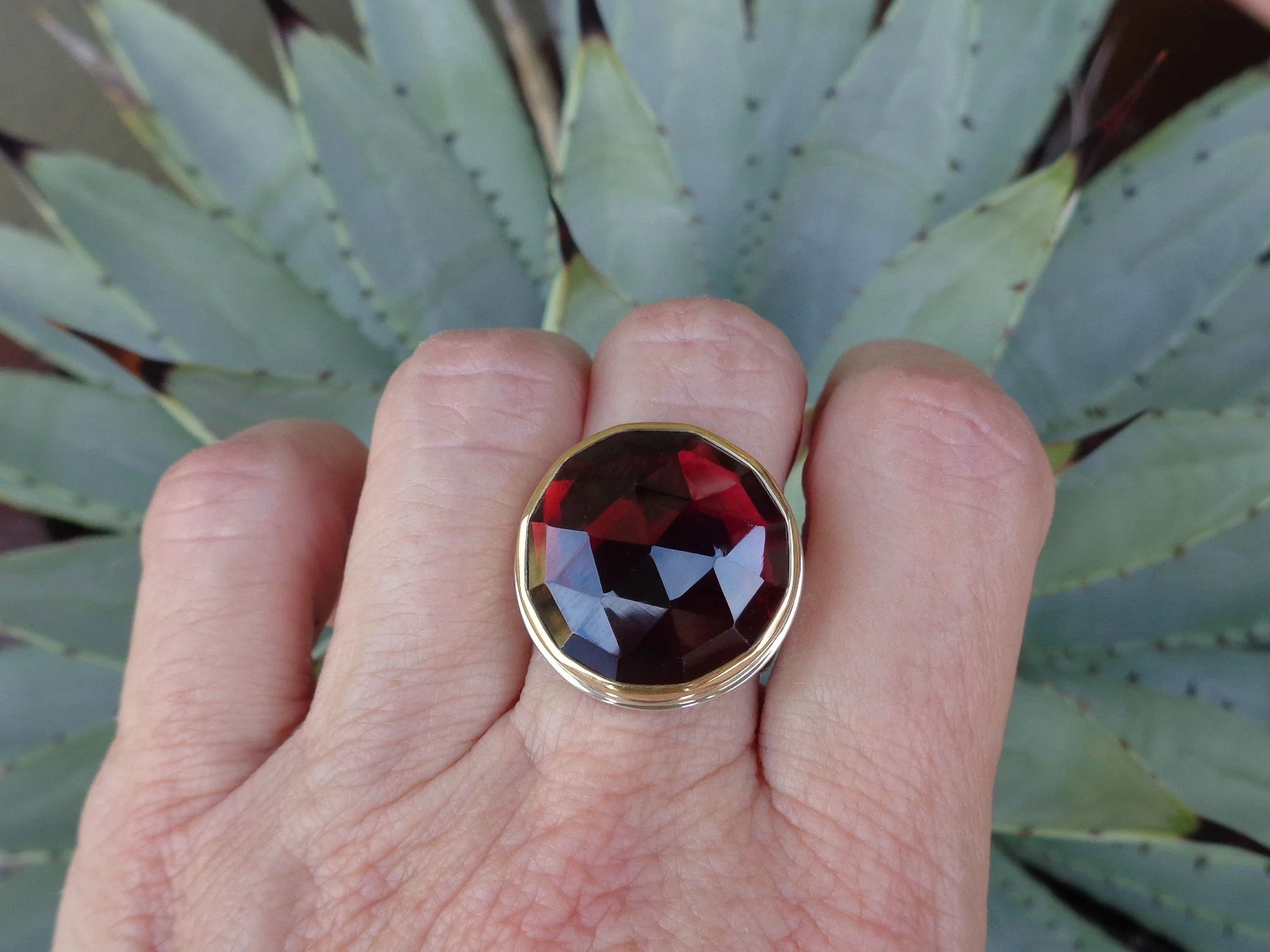 gold and silver ring with large garnet x.jpg