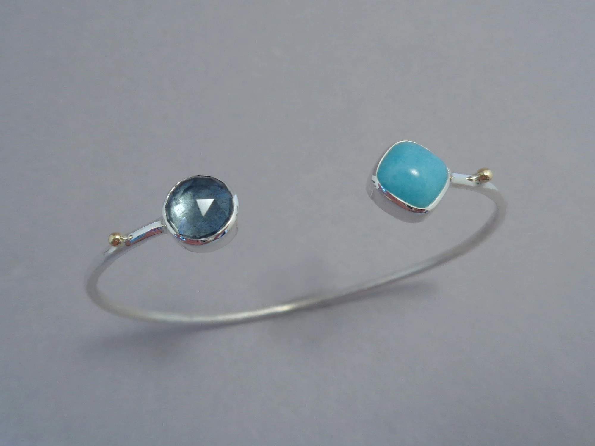 silver cuff bracelet with blue stones x.jpg