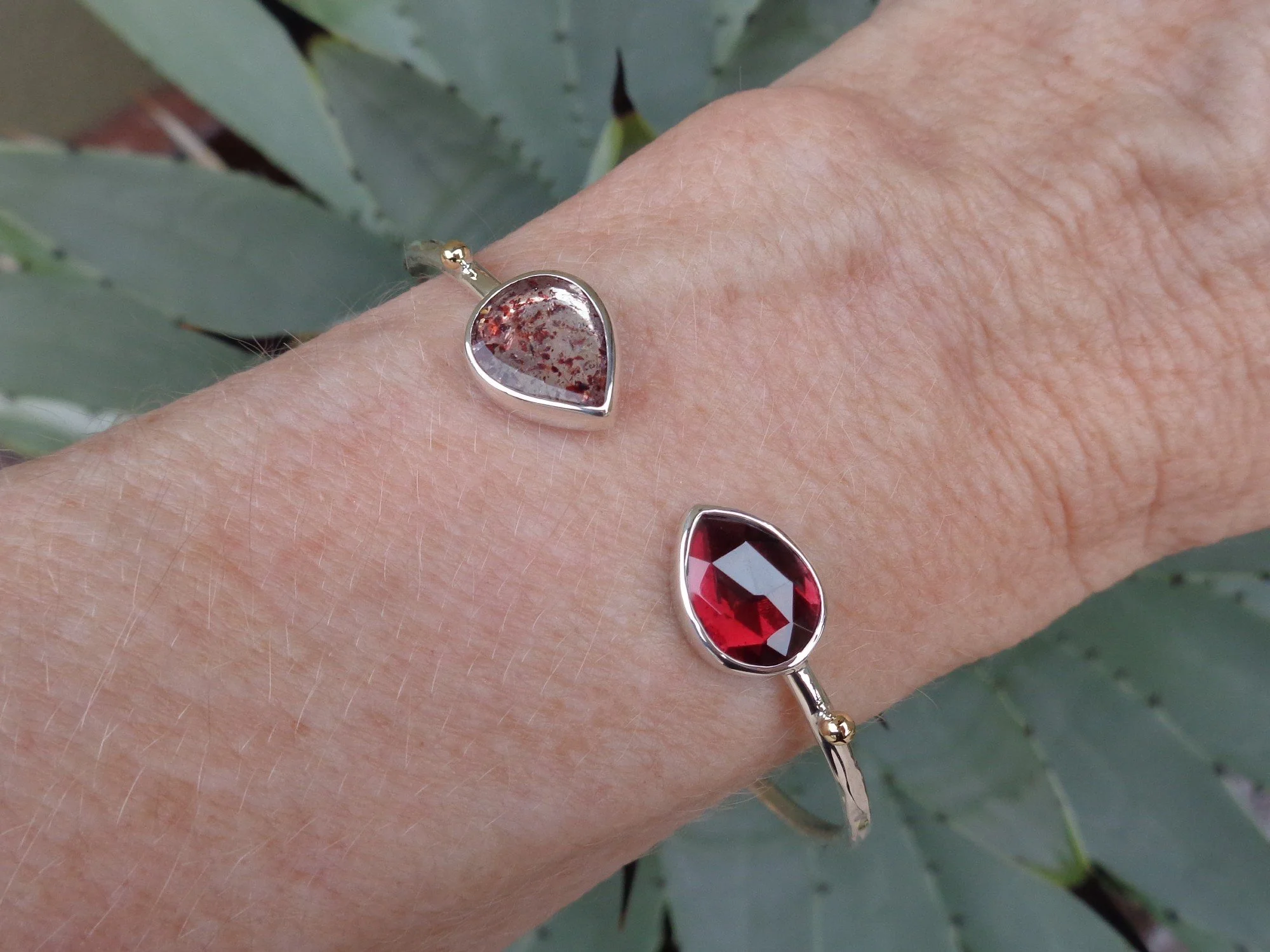pear shaped red stones cuff x.jpg
