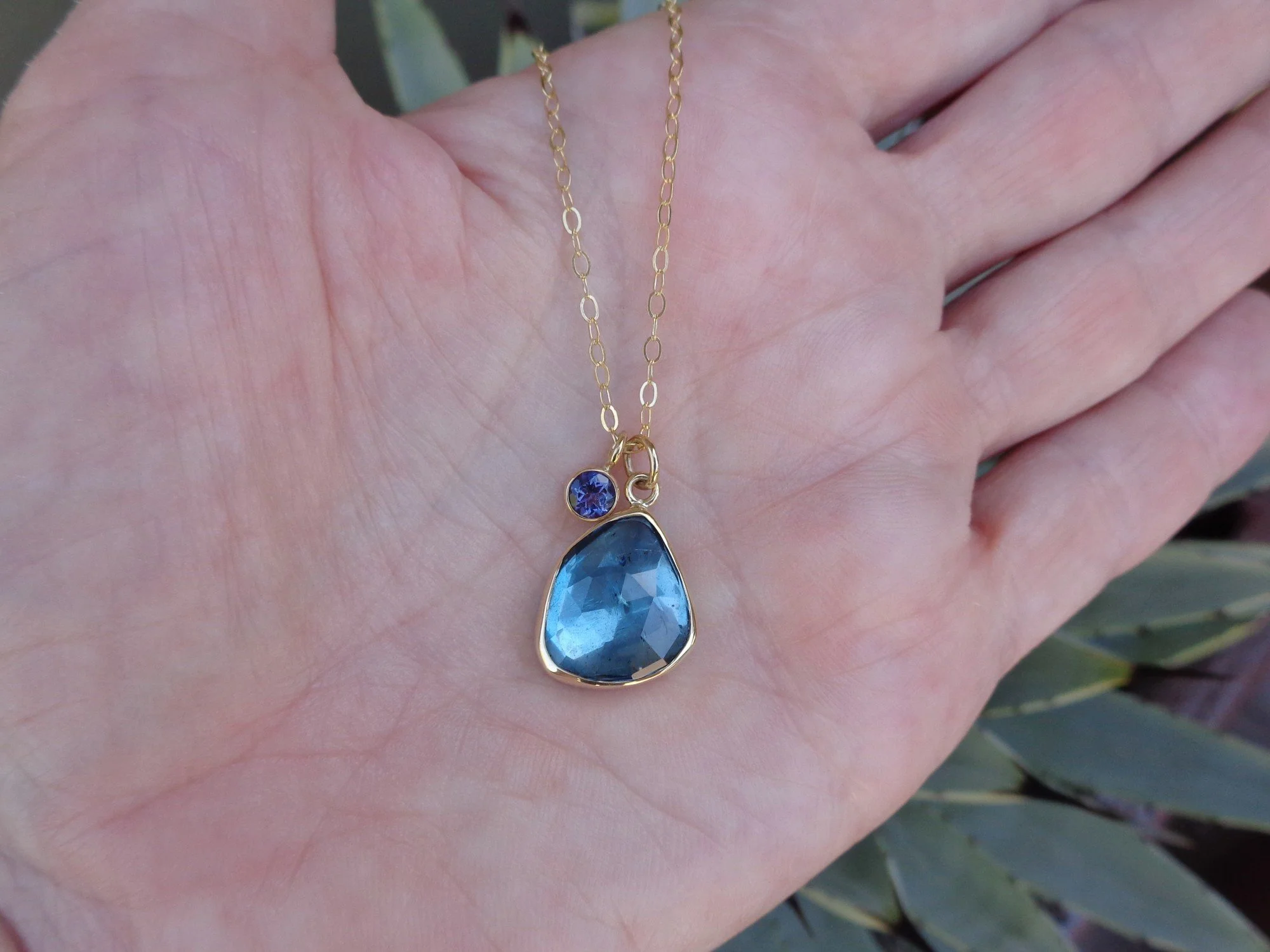 triangular shaped blue topaz and iolite pendant x.jpg