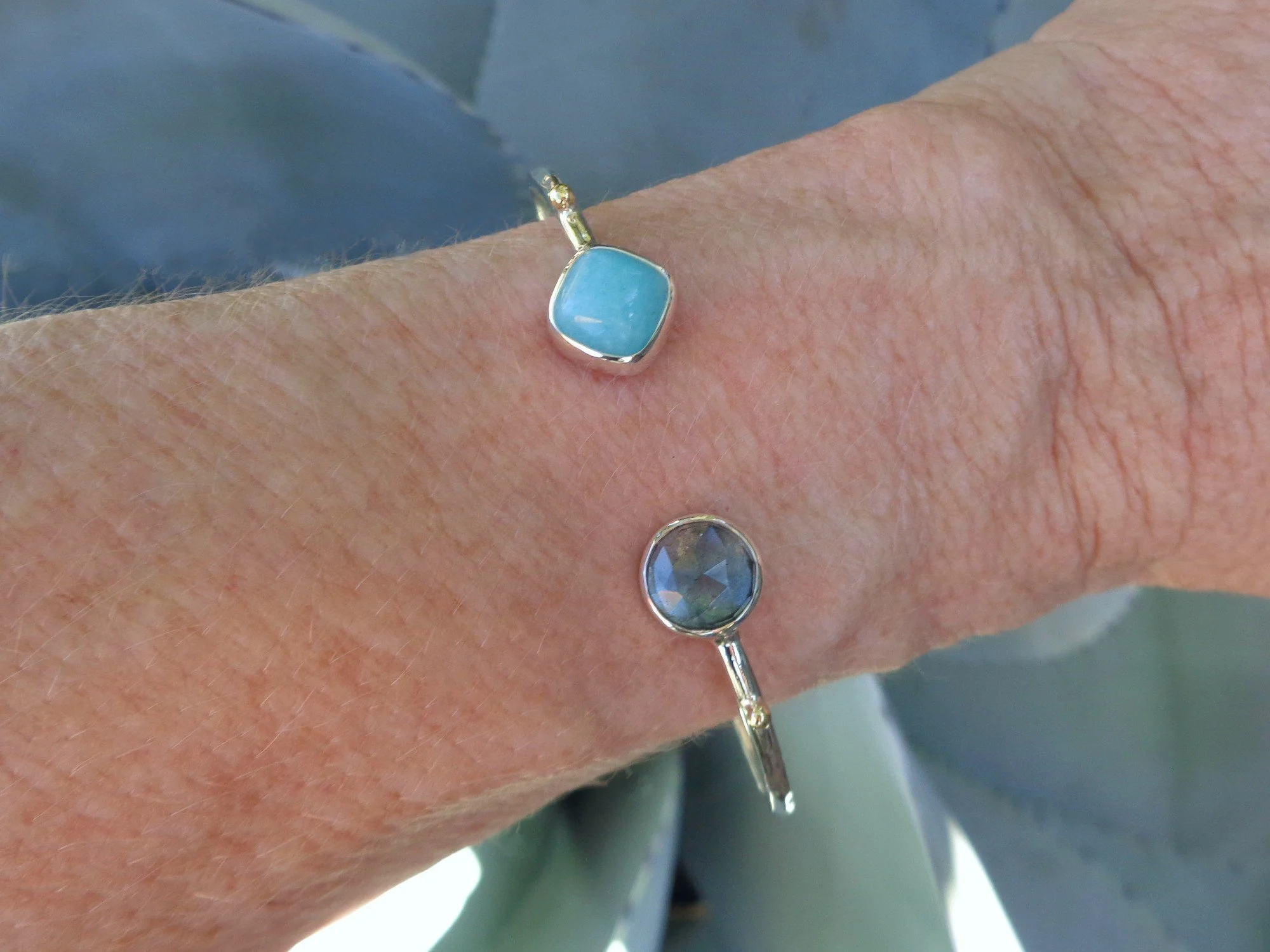 cuff bracelet with blue gemstones x.jpg