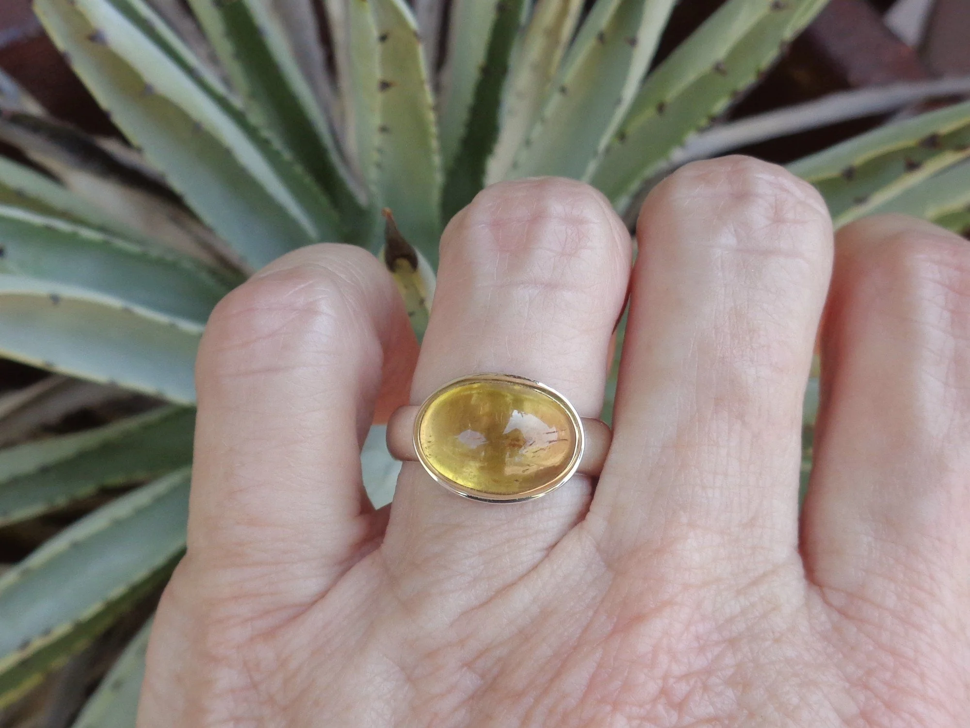 yellow peach tourmaline ring x.jpg