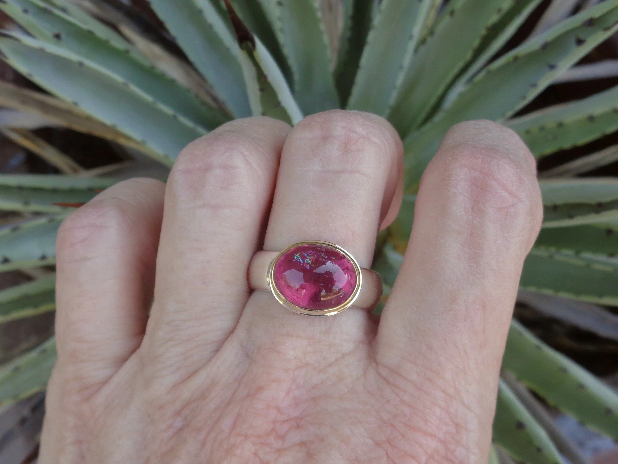 pink tourmaline ring with rainbow x.jpg