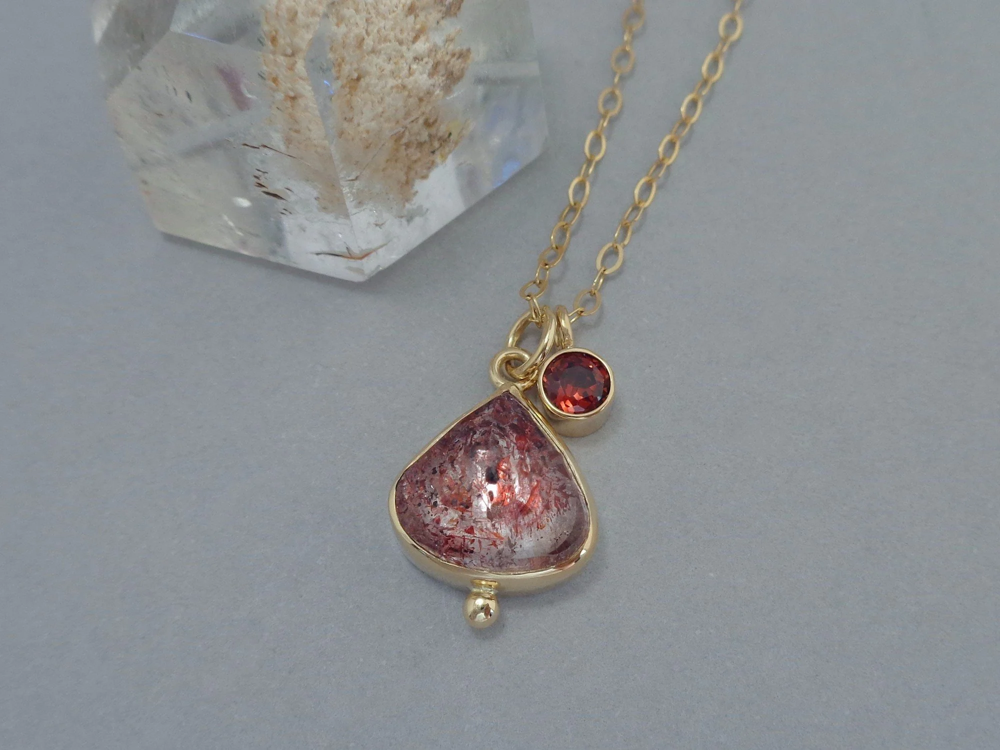 pear shaped strawberry quartz x.jpg