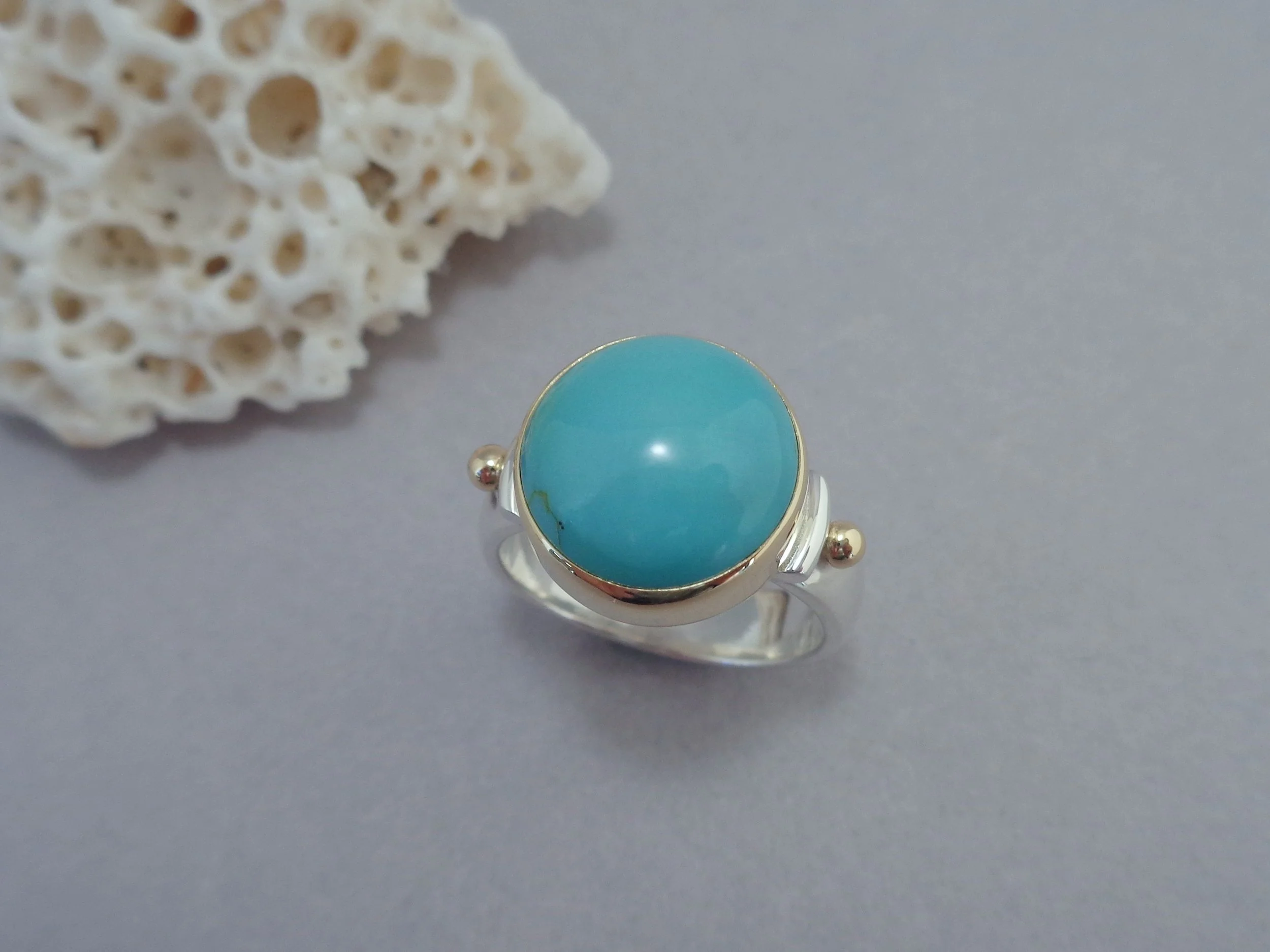 Supernova turquoise in 18k gold and sterling.jpg