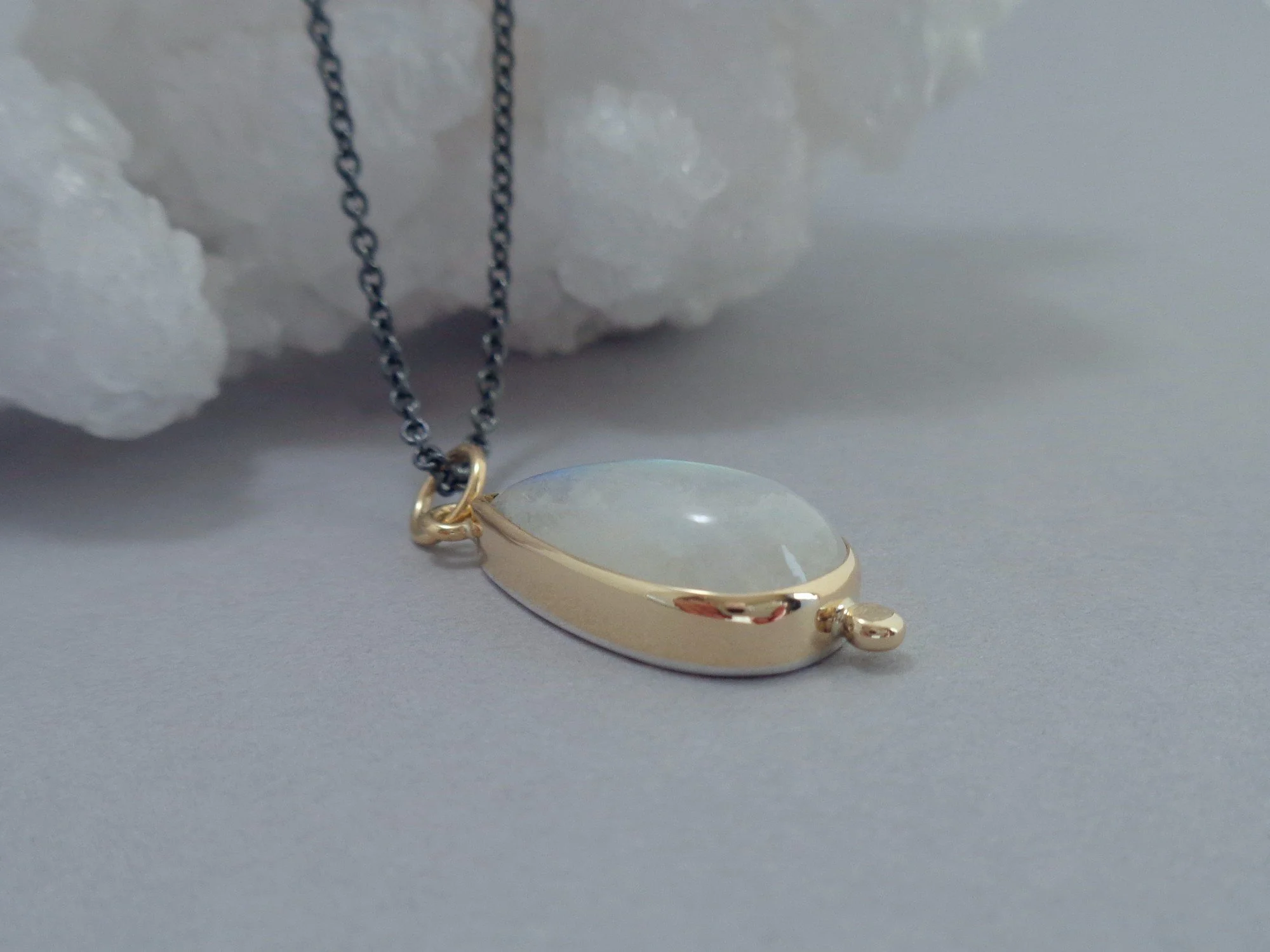 rainbow moonstone pendant in gold x.jpg