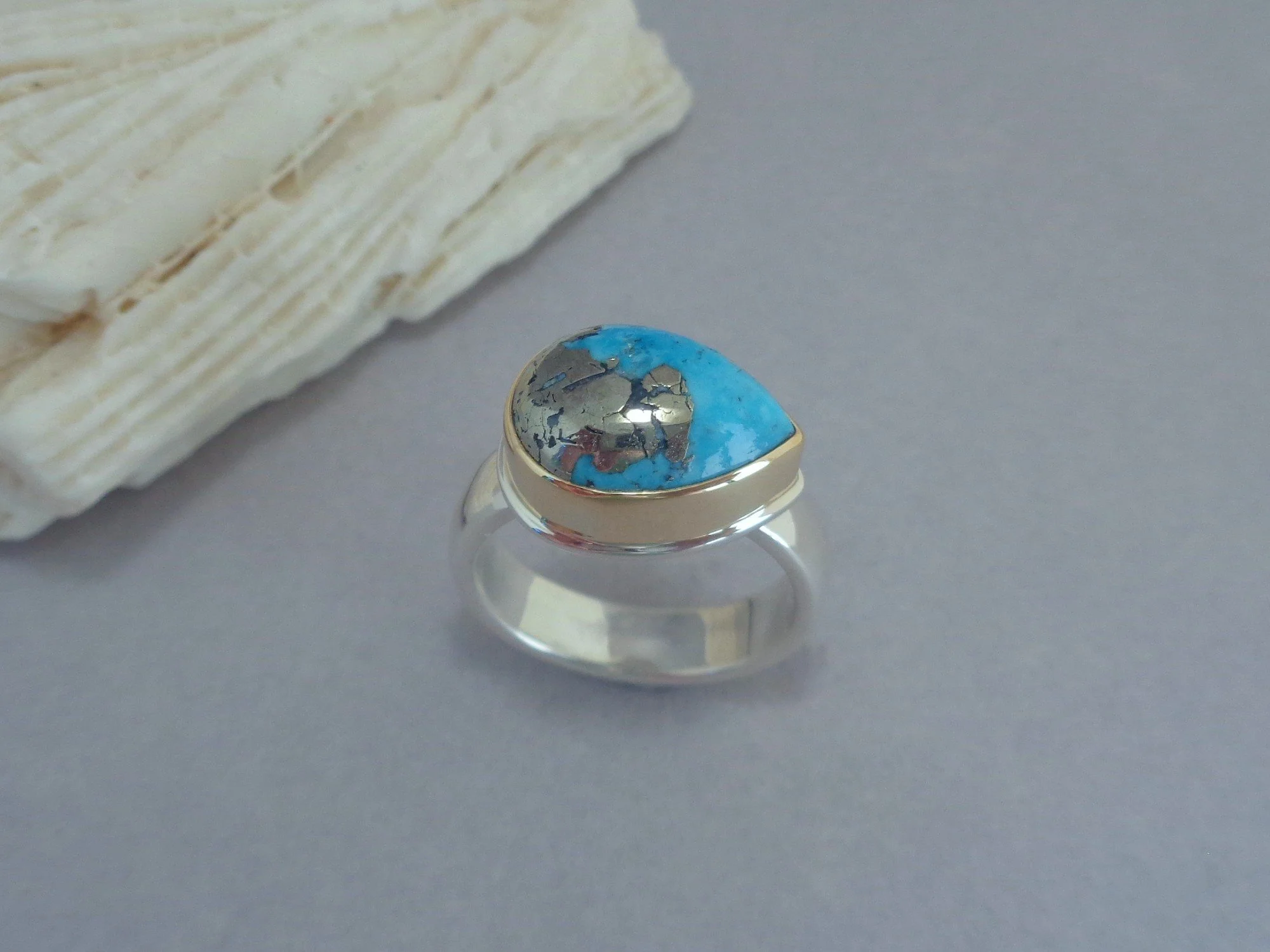 Iranian turquoise in gold and silver ring x.jpg