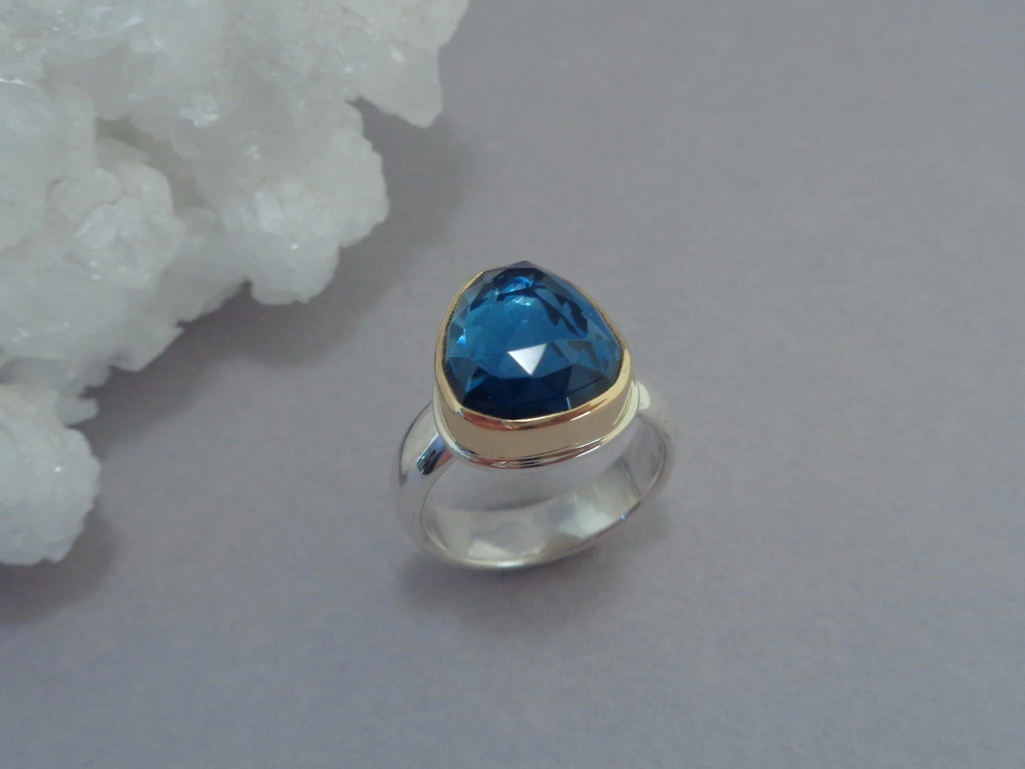 faceted blue topaz ring x.jpg