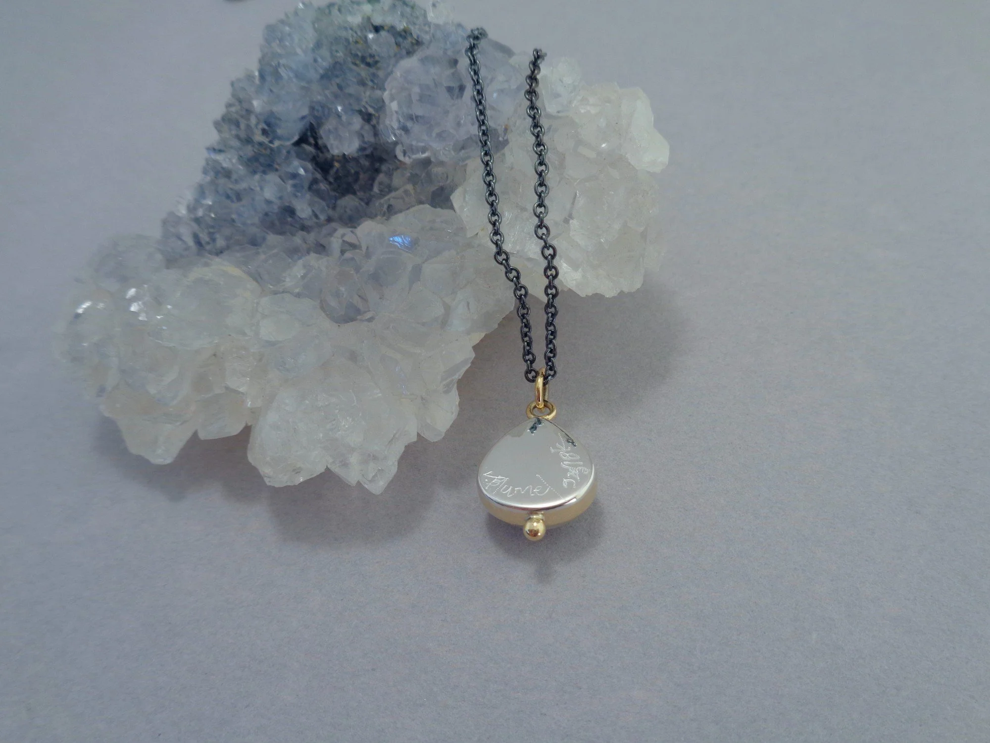 silver and gold pendant x.jpg
