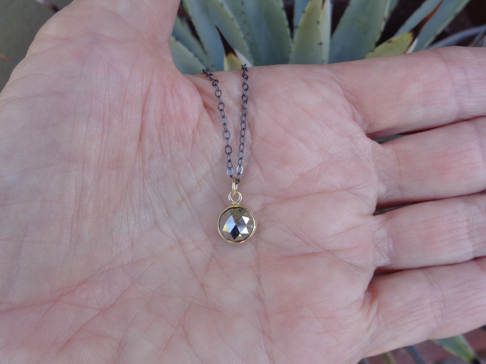 tiny pyrite pendant x.jpg