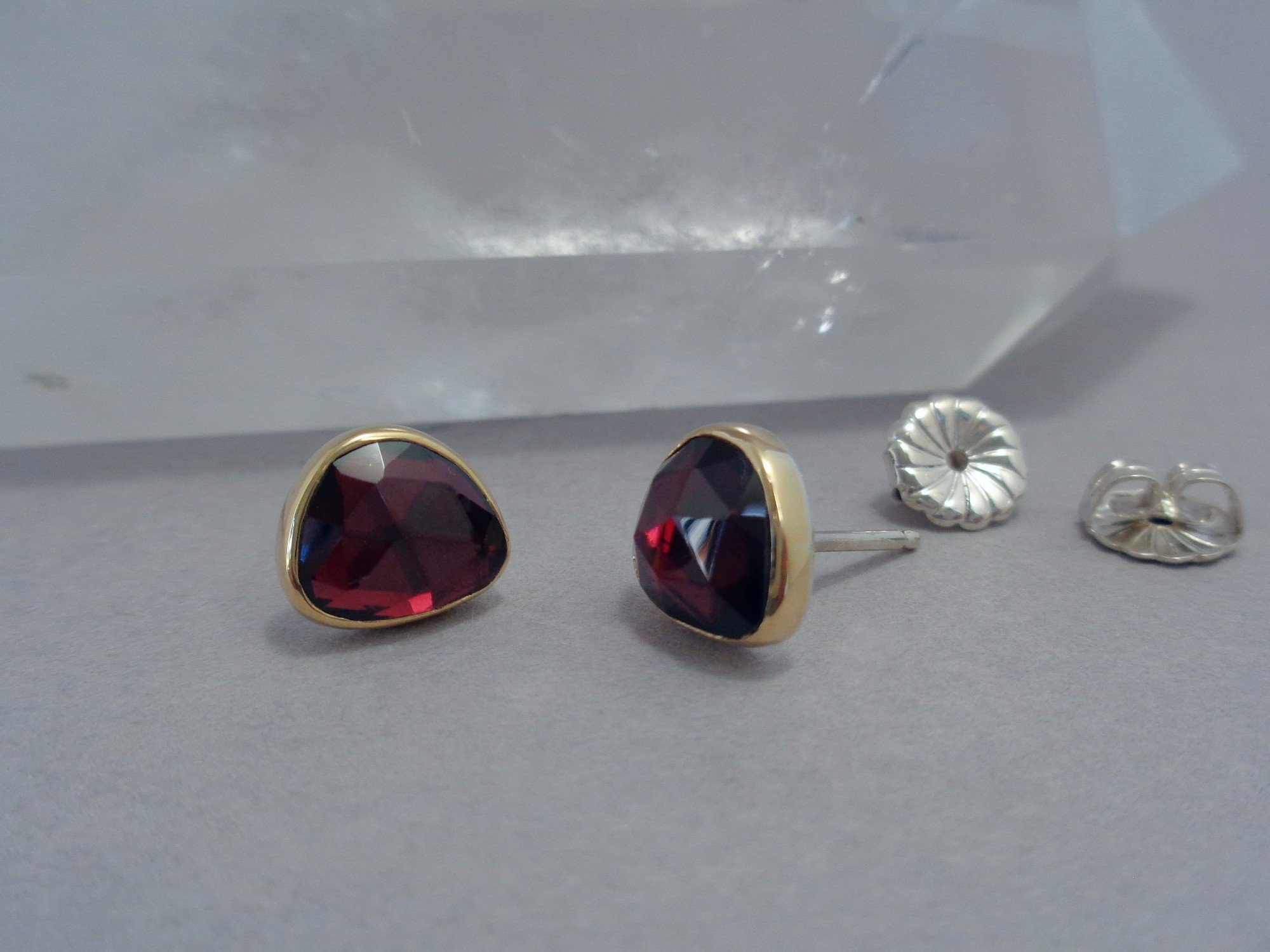 silver and gold post earrings with garnet x.jpg