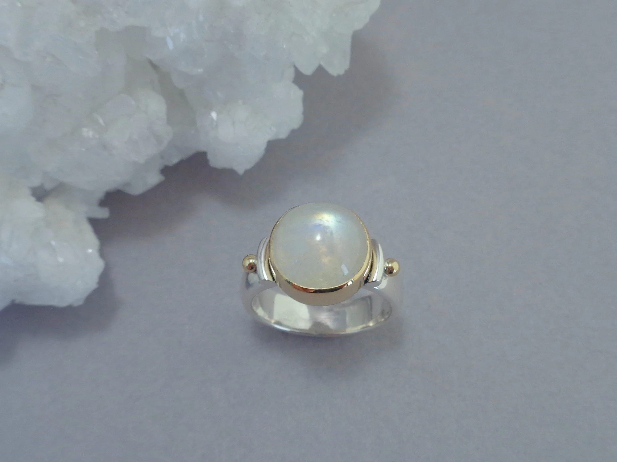 round rainbow moonstone ring x.jpg