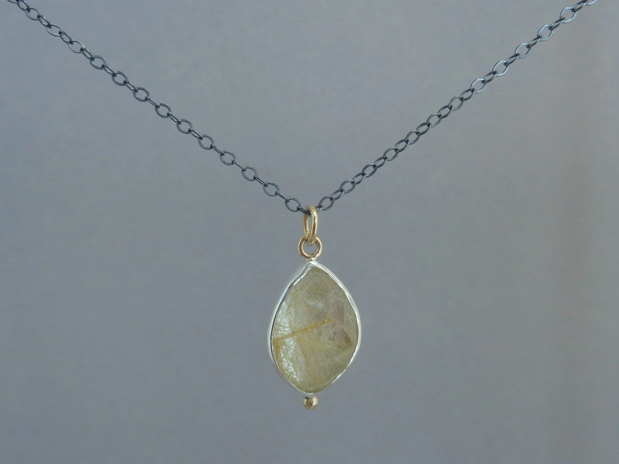 rutilated quartz pendant x.jpg