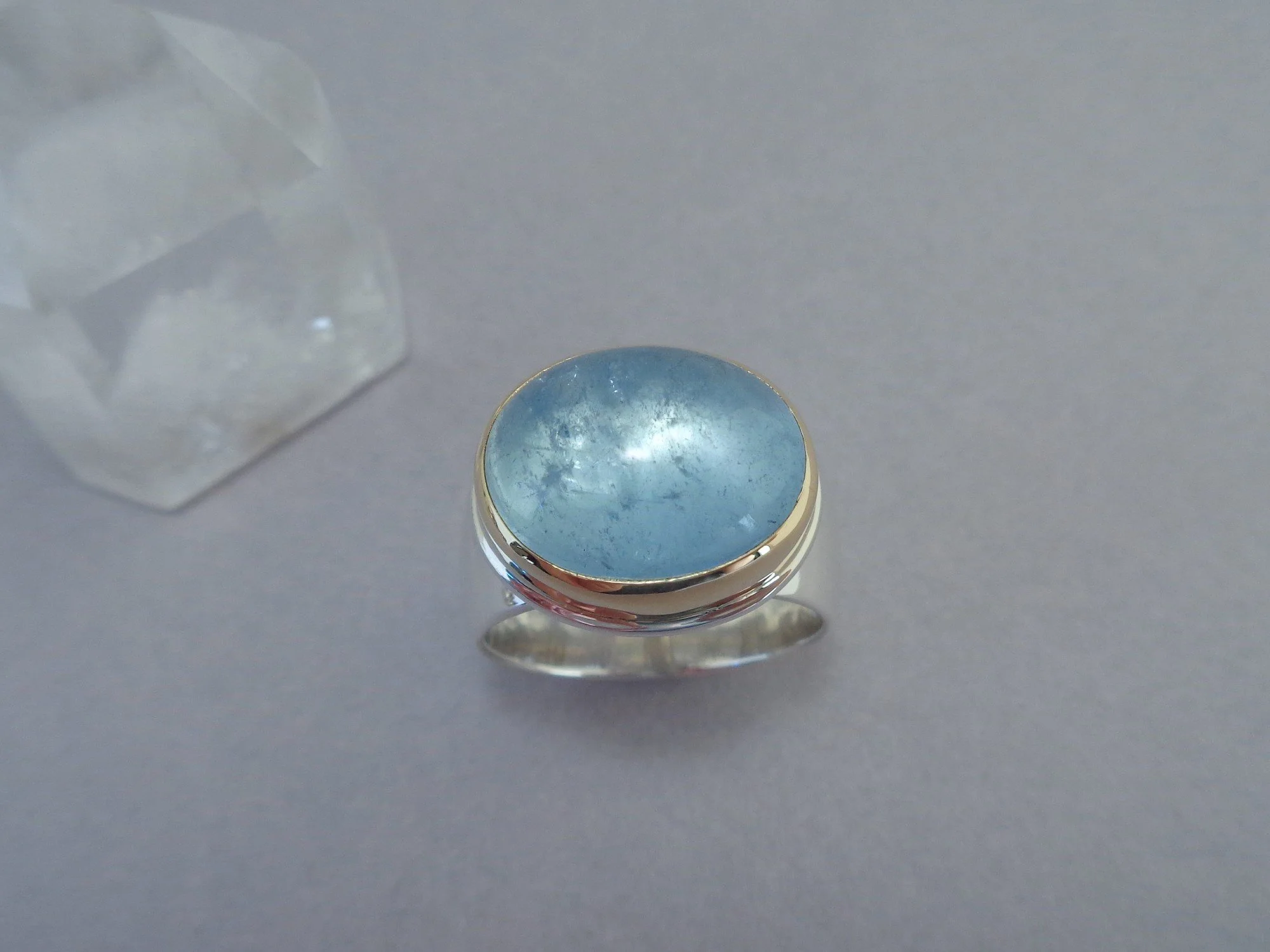 cabochon aquamarine ring in gold and silver x.jpg