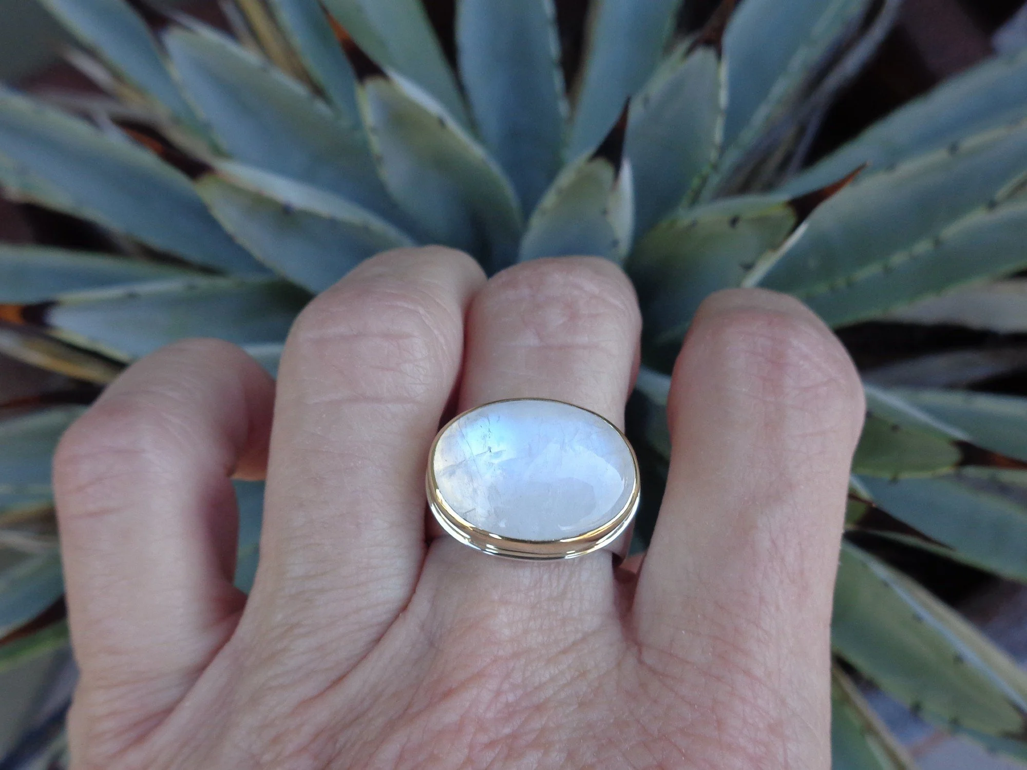 rainbow moonstone ring in gold and silver x.jpg