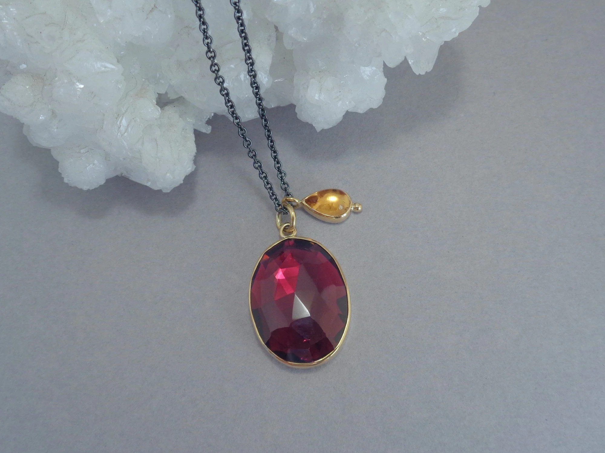 large garnet pendant with citrine accent x.jpg
